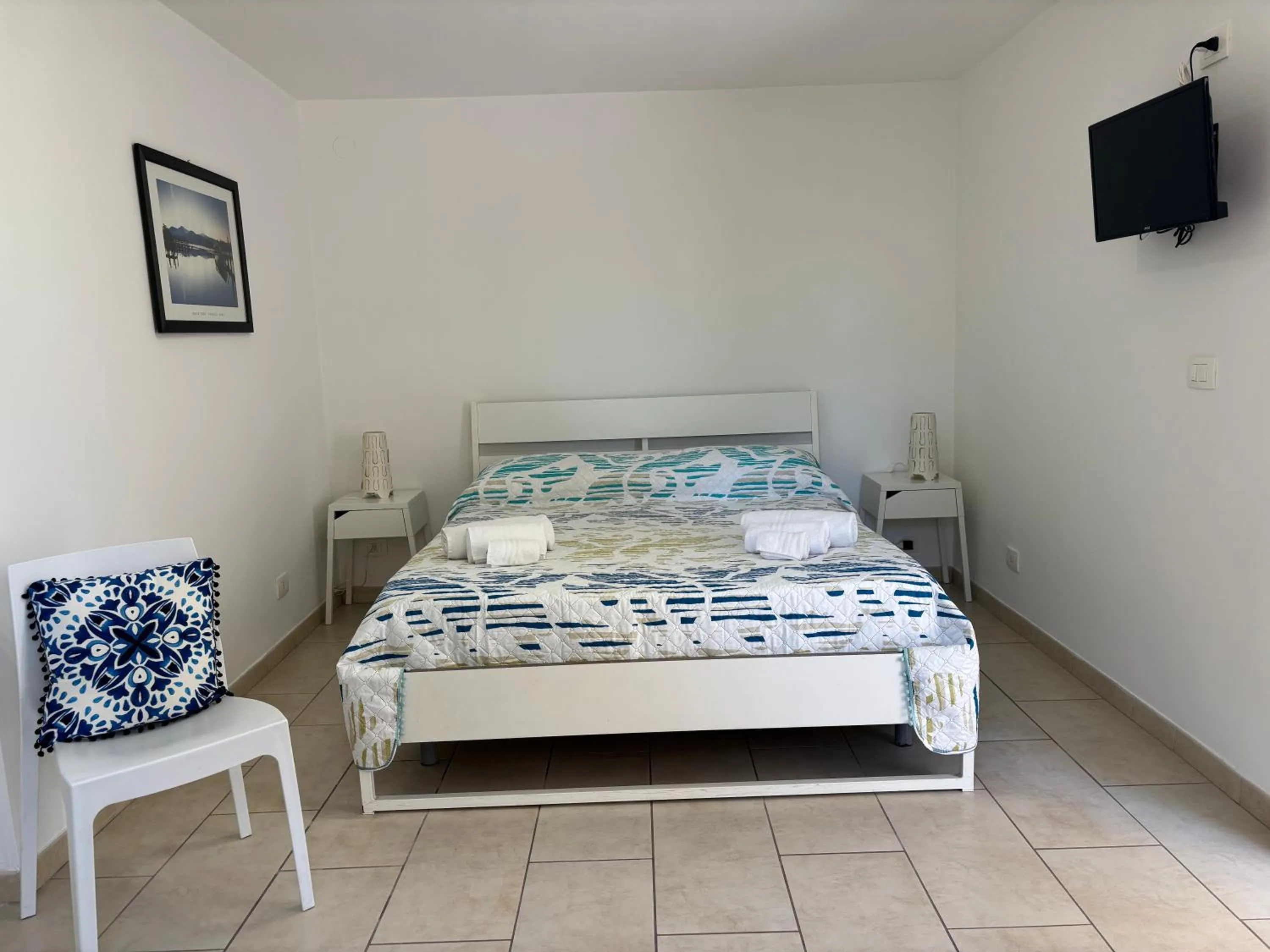 Bedroom, Bed in Le Torrette Rooms and Apartments