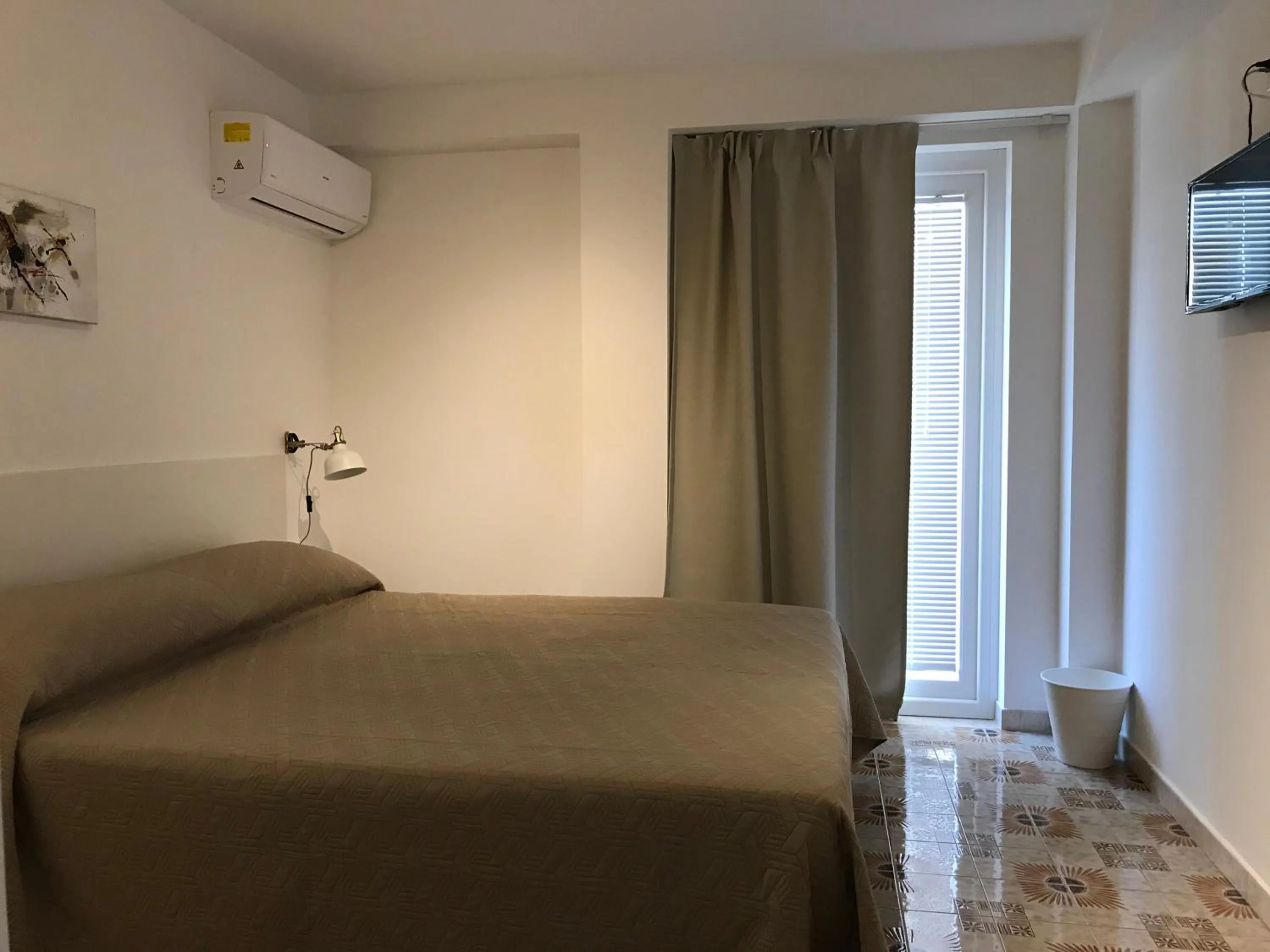 Bedroom, Bed in Le Torrette Rooms and Apartments