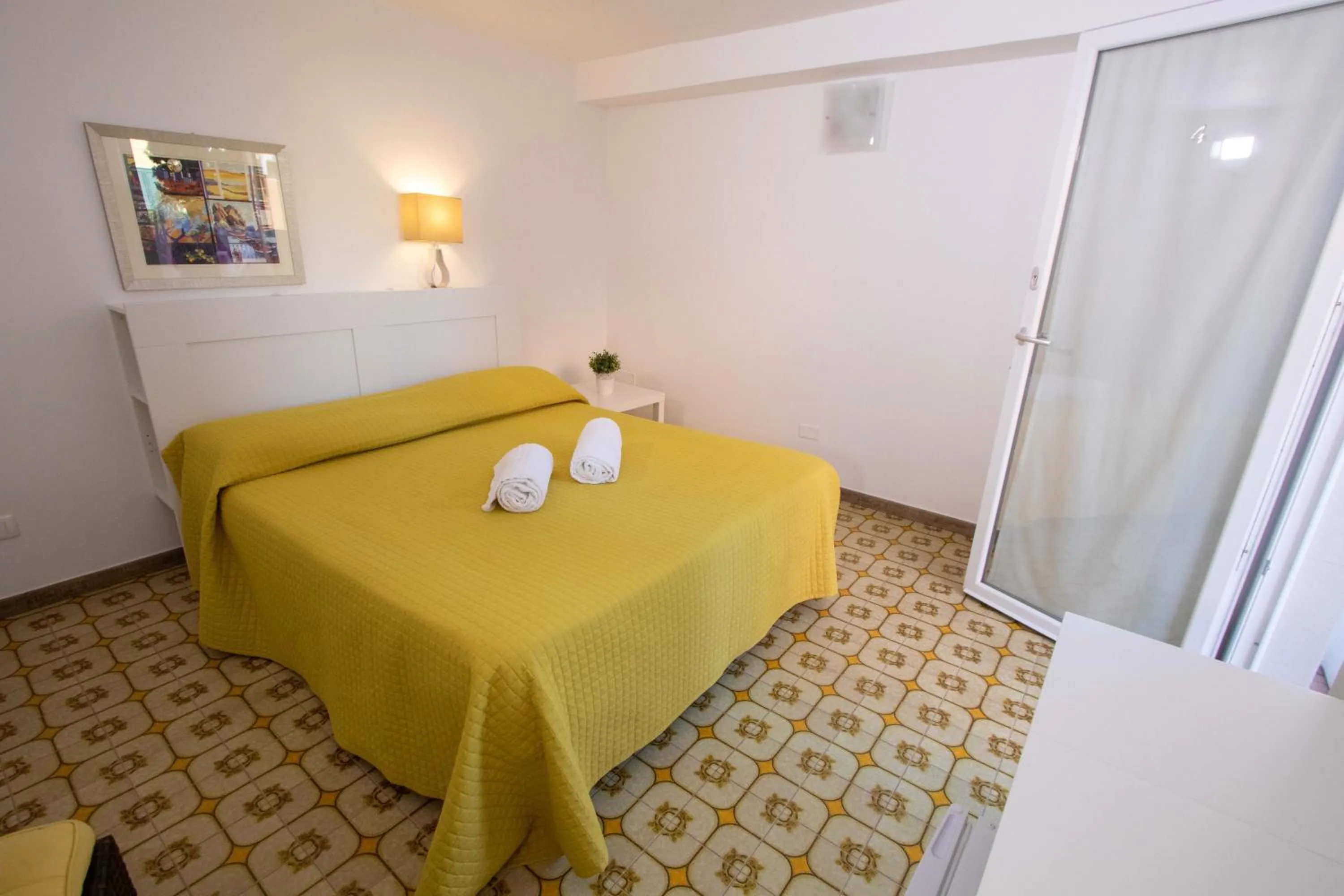 Bedroom, Bed in Le Torrette Rooms and Apartments