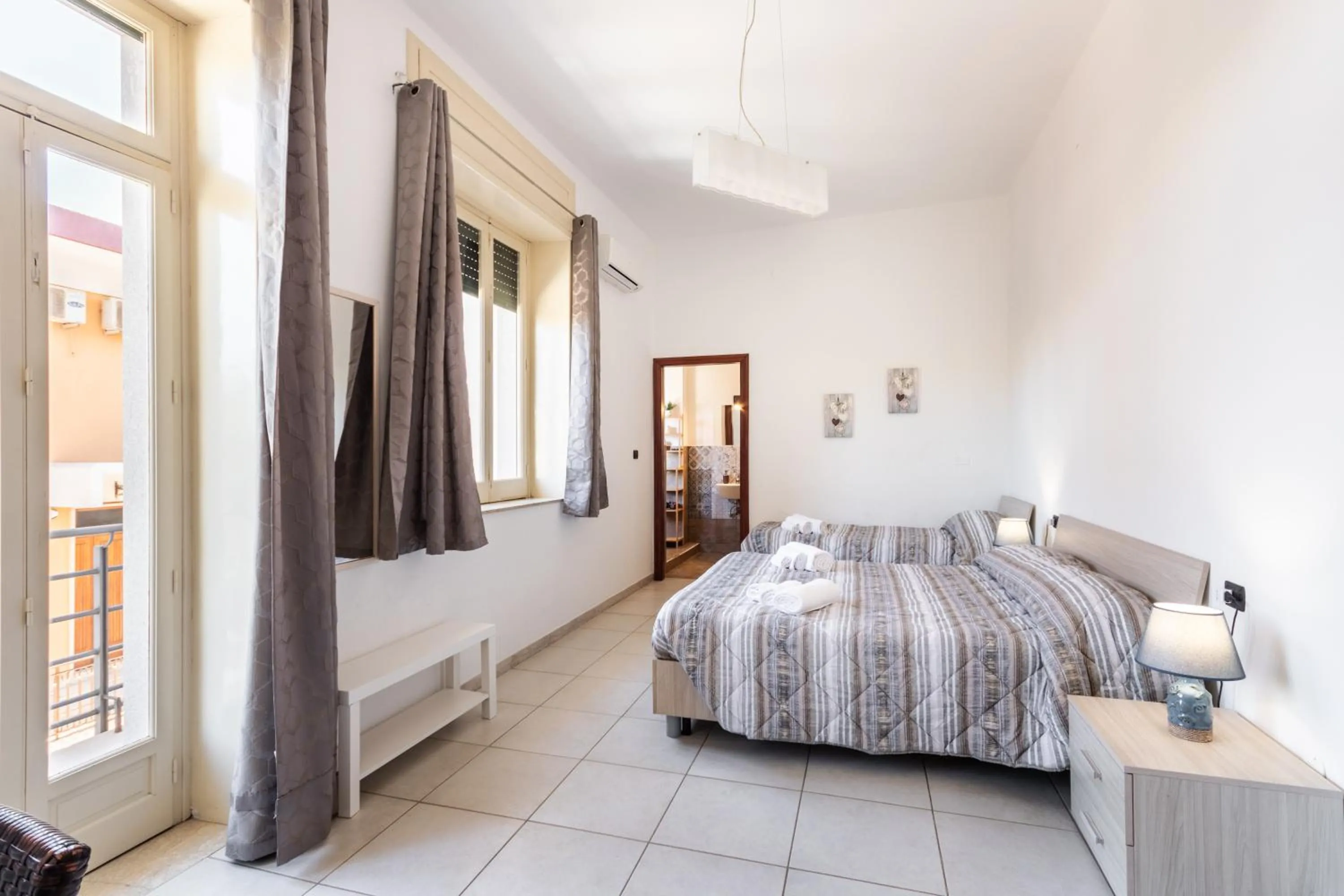 Bedroom, Bed in Le Torrette Rooms and Apartments