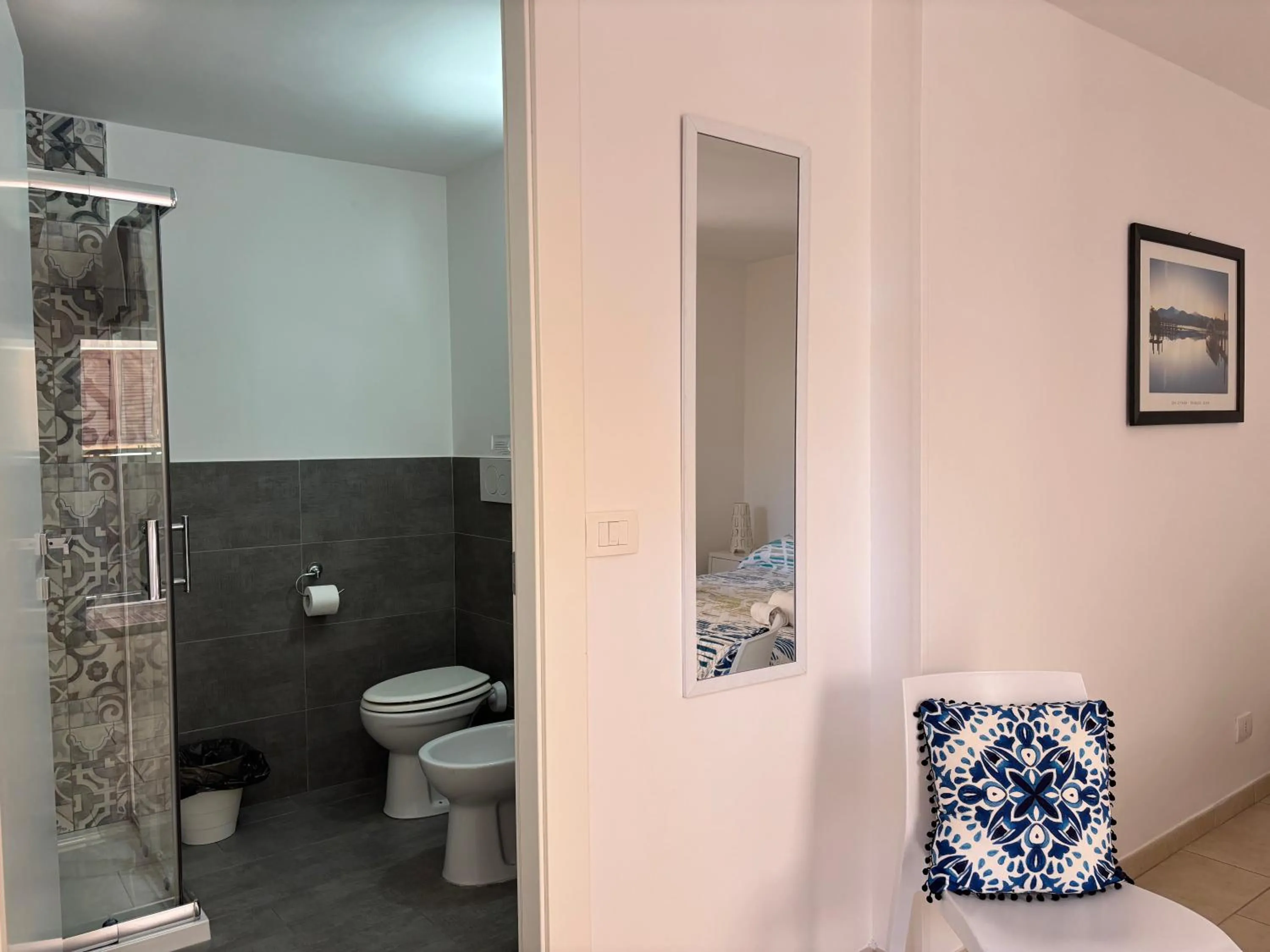 Shower in Le Torrette Rooms and Apartments