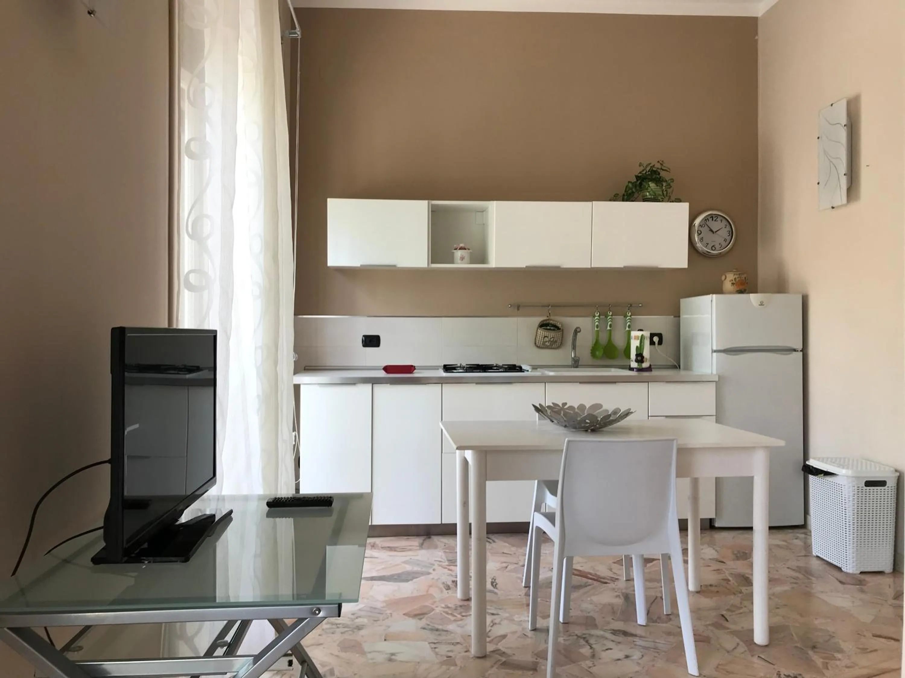 Living room in Le Torrette Rooms and Apartments