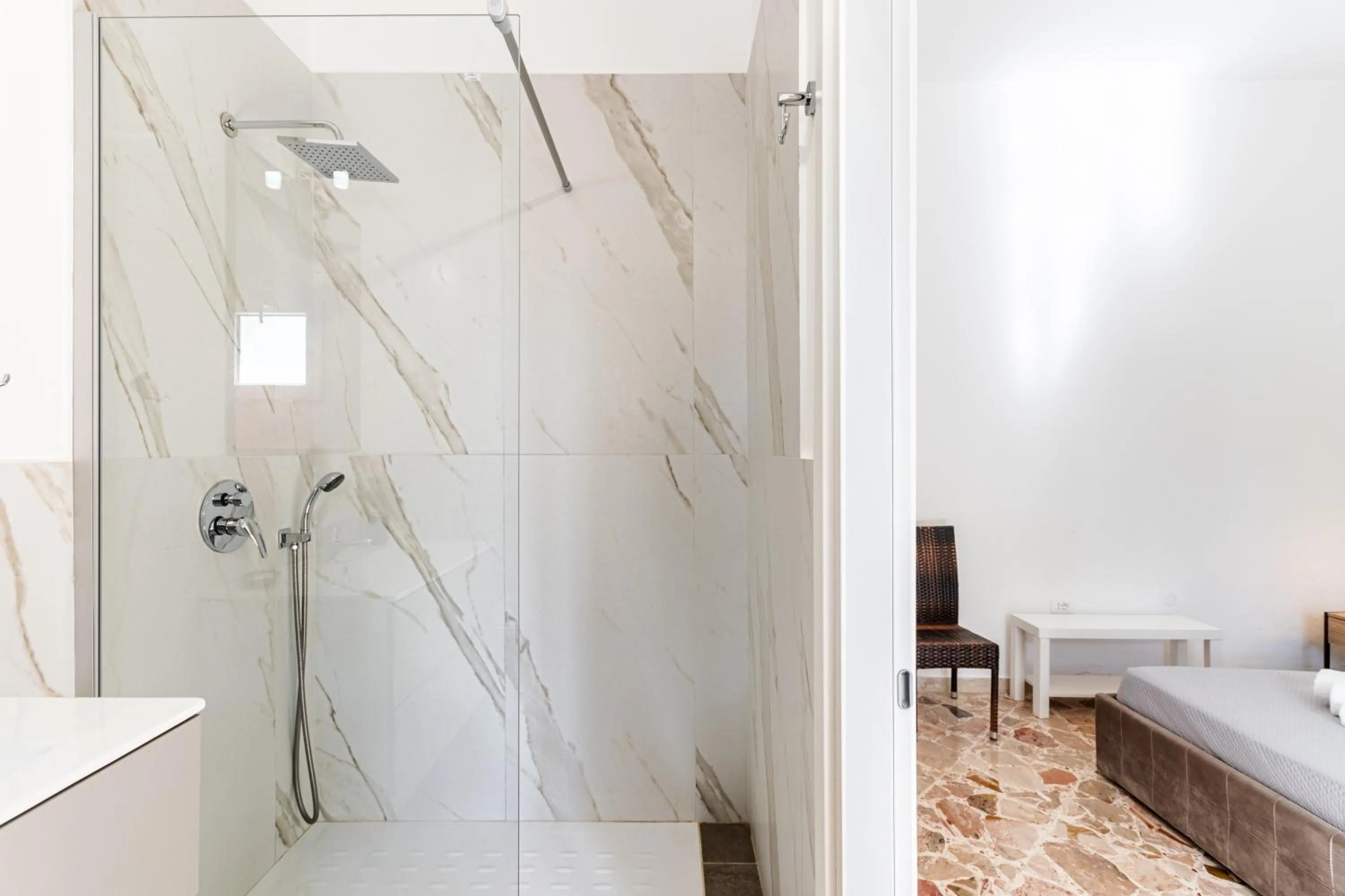 Shower in Le Torrette Rooms and Apartments