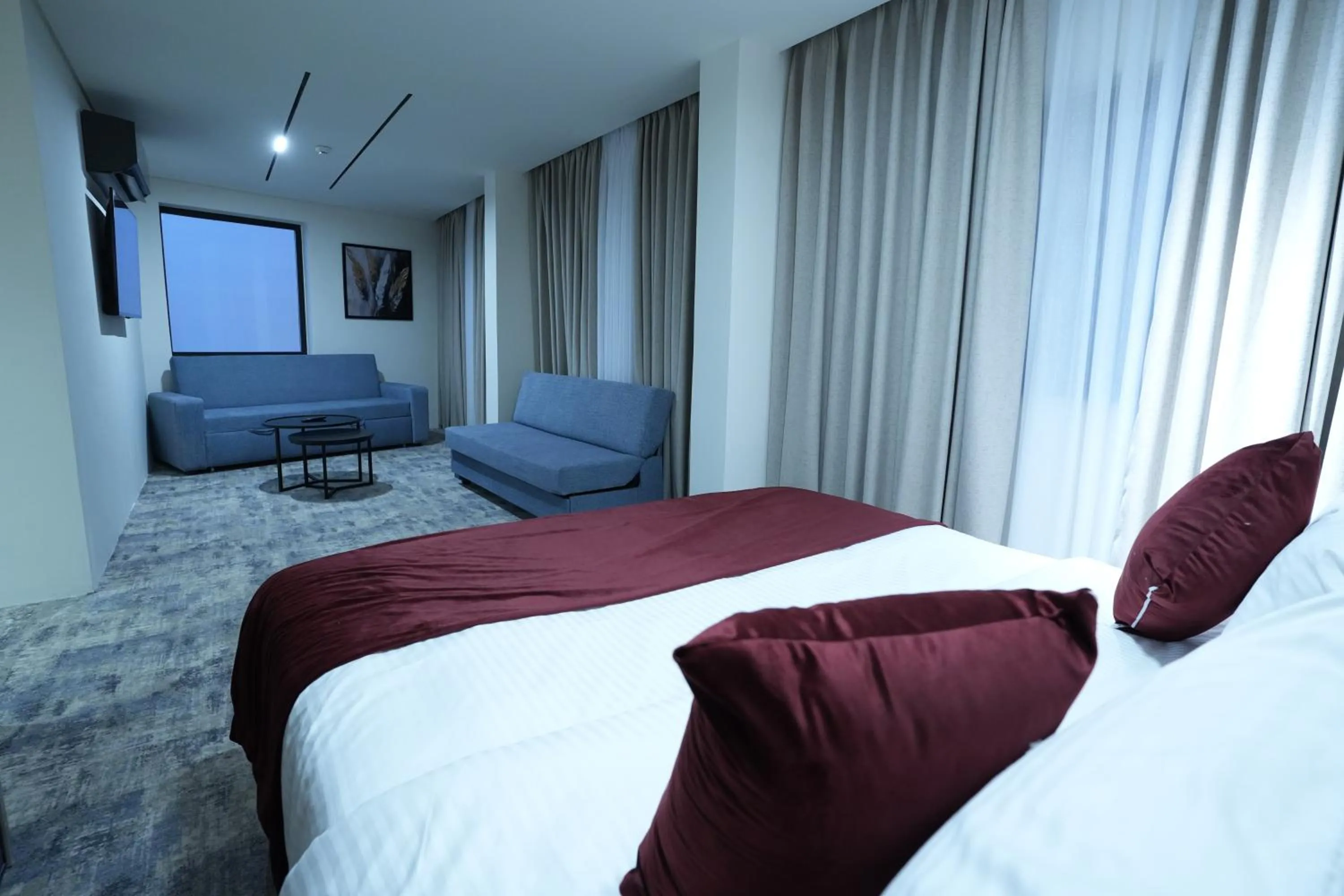 Bed in Roya Downtown Boutique Hotel