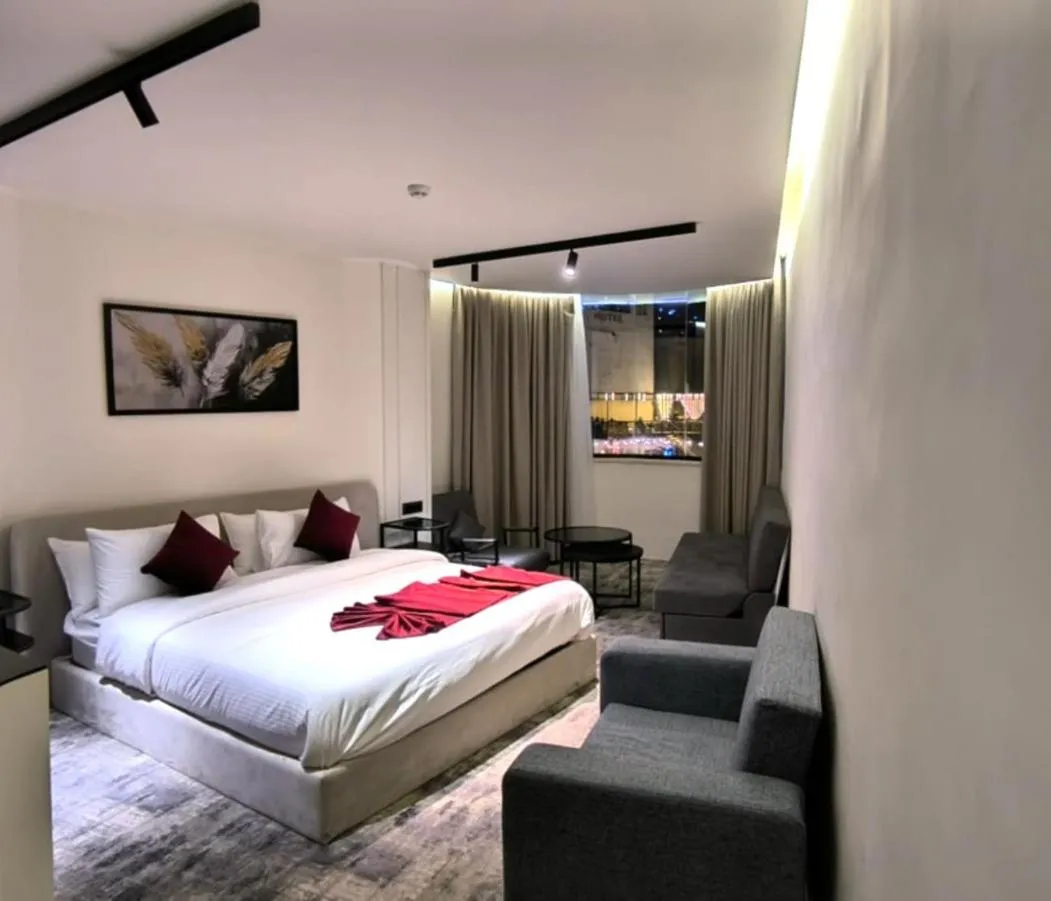Bed in Roya Downtown Boutique Hotel