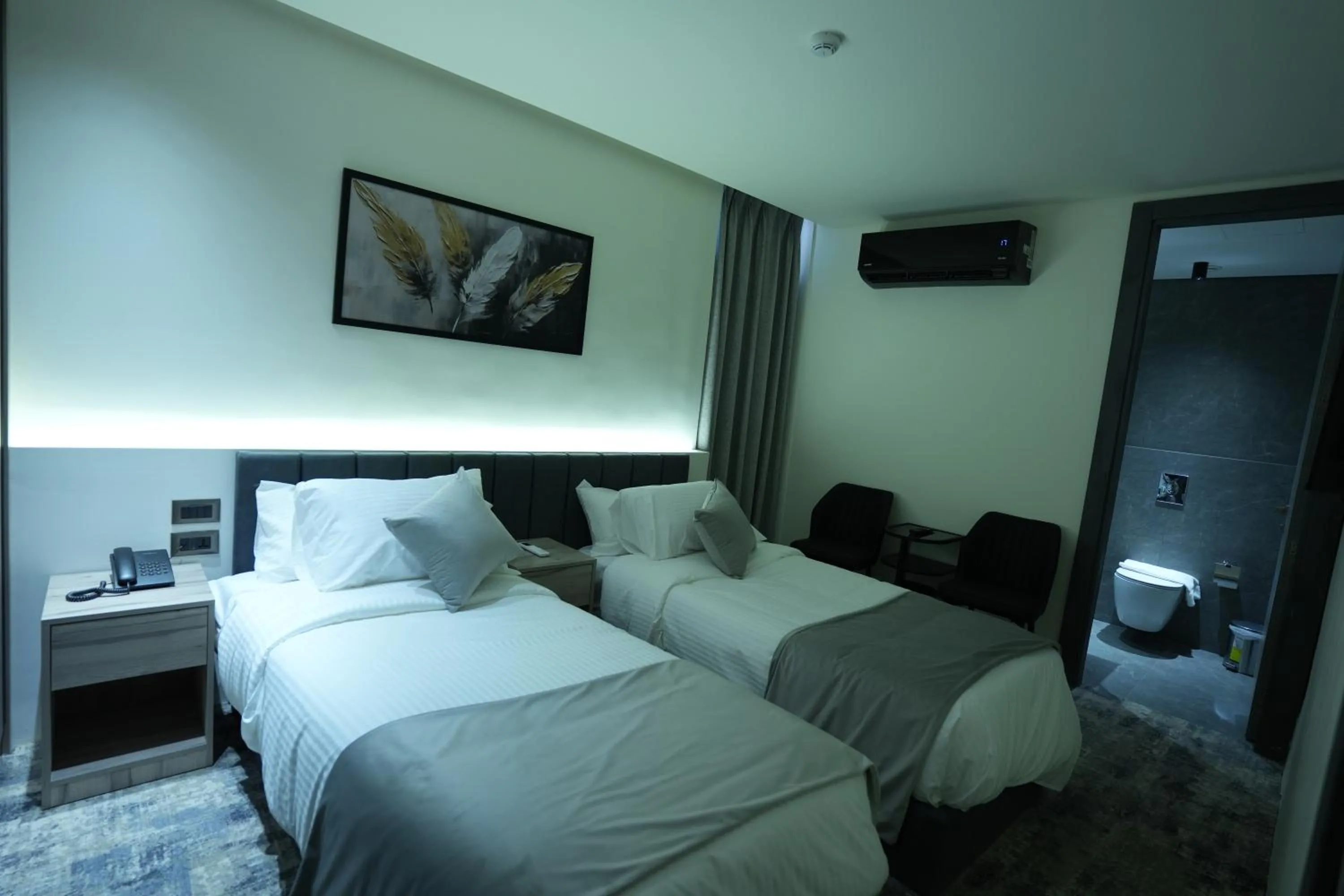 Bed in Roya Downtown Boutique Hotel