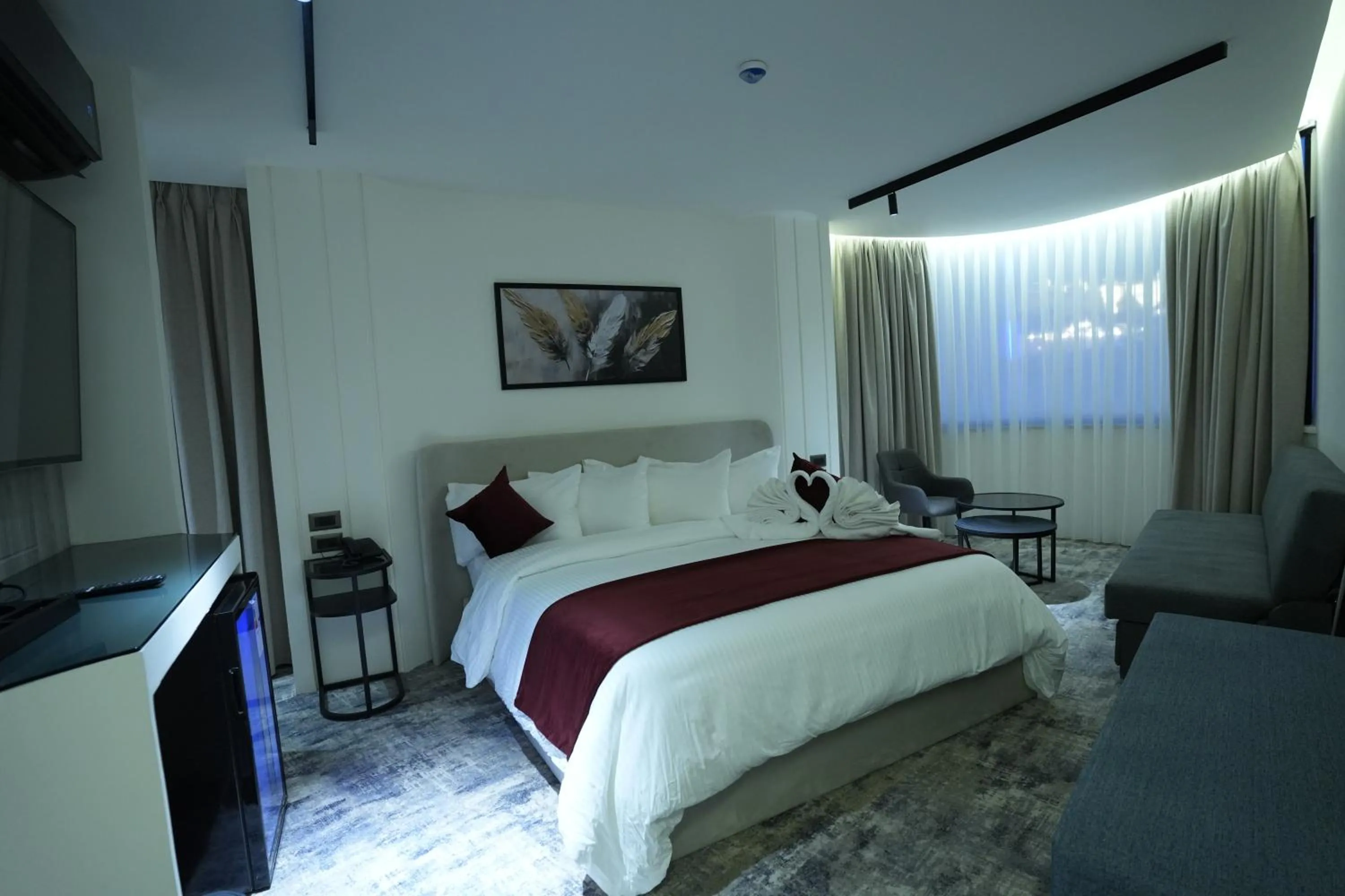 Bed in Roya Downtown Boutique Hotel