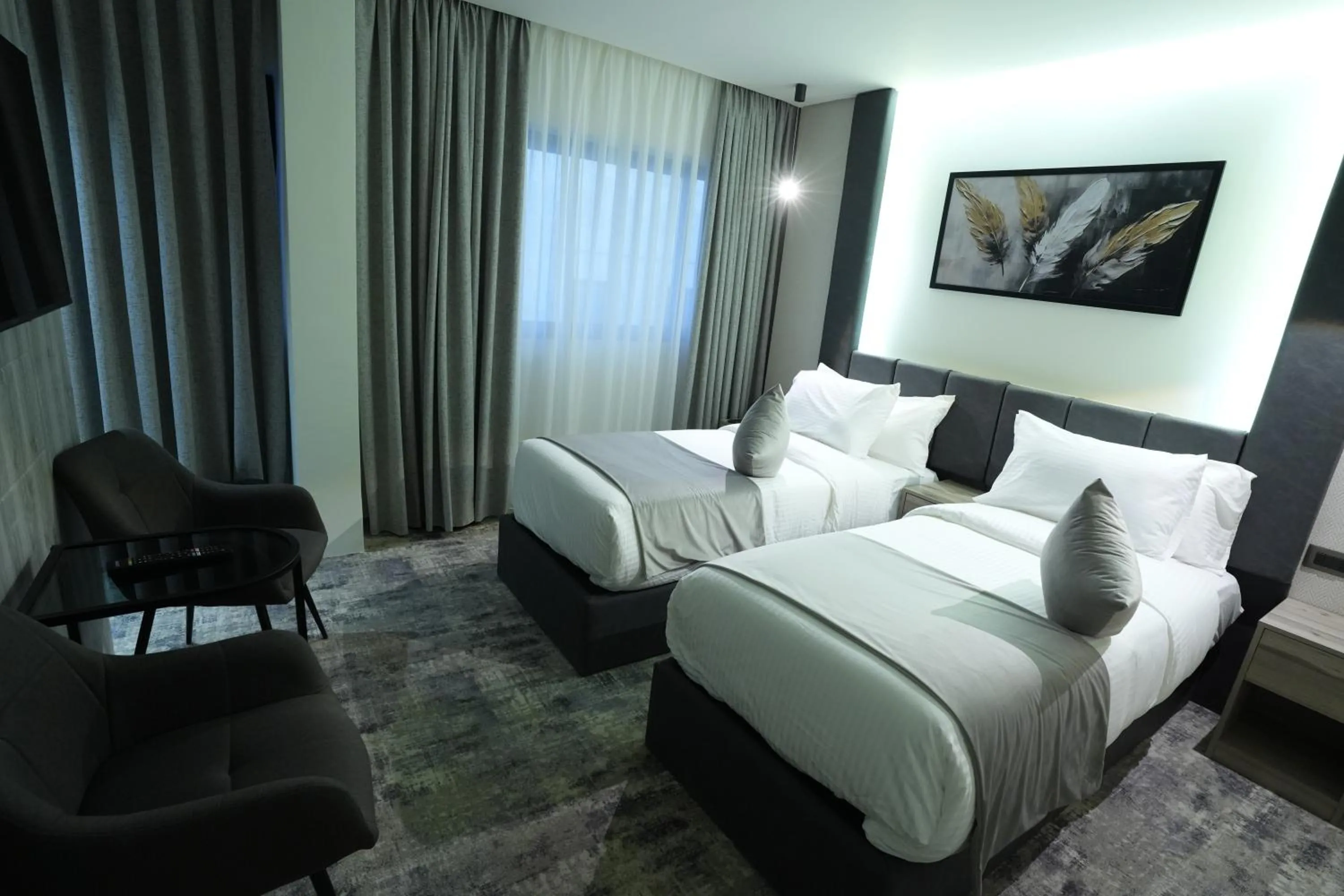 Bed in Roya Downtown Boutique Hotel