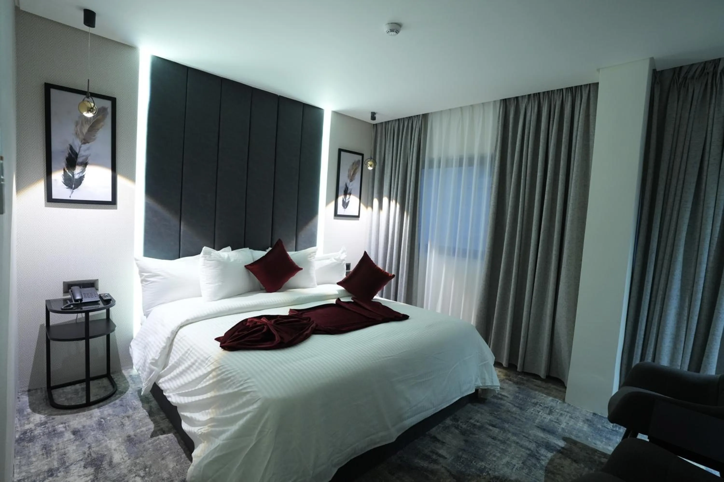 Bed in Roya Downtown Boutique Hotel