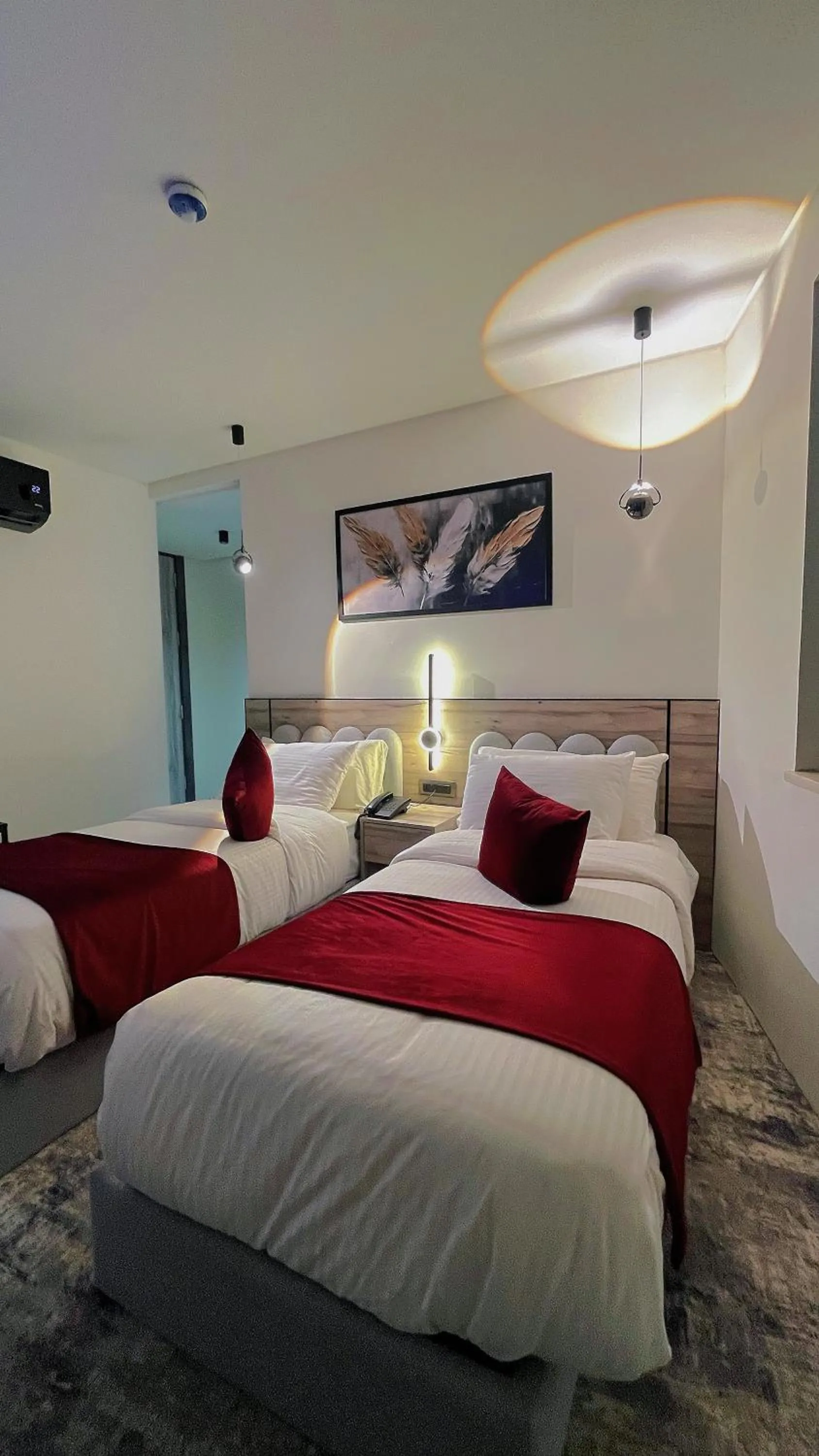 Bed in Roya Downtown Boutique Hotel
