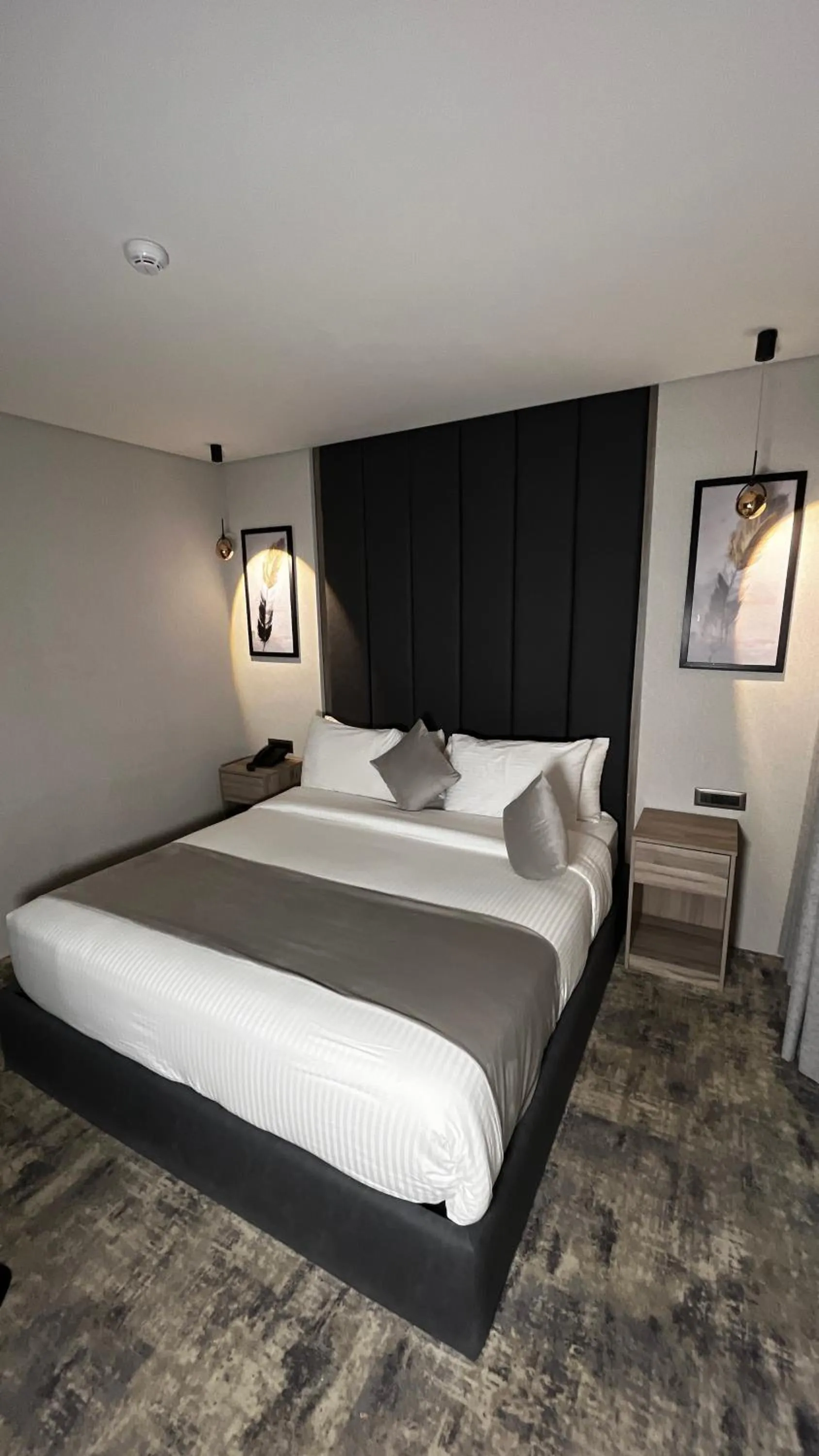 Bed in Roya Downtown Boutique Hotel