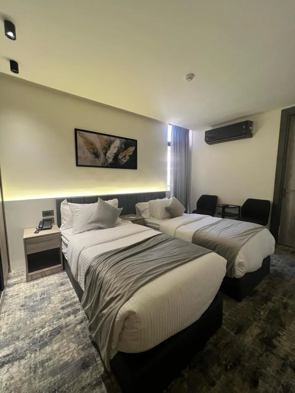 Bed in Roya Downtown Boutique Hotel