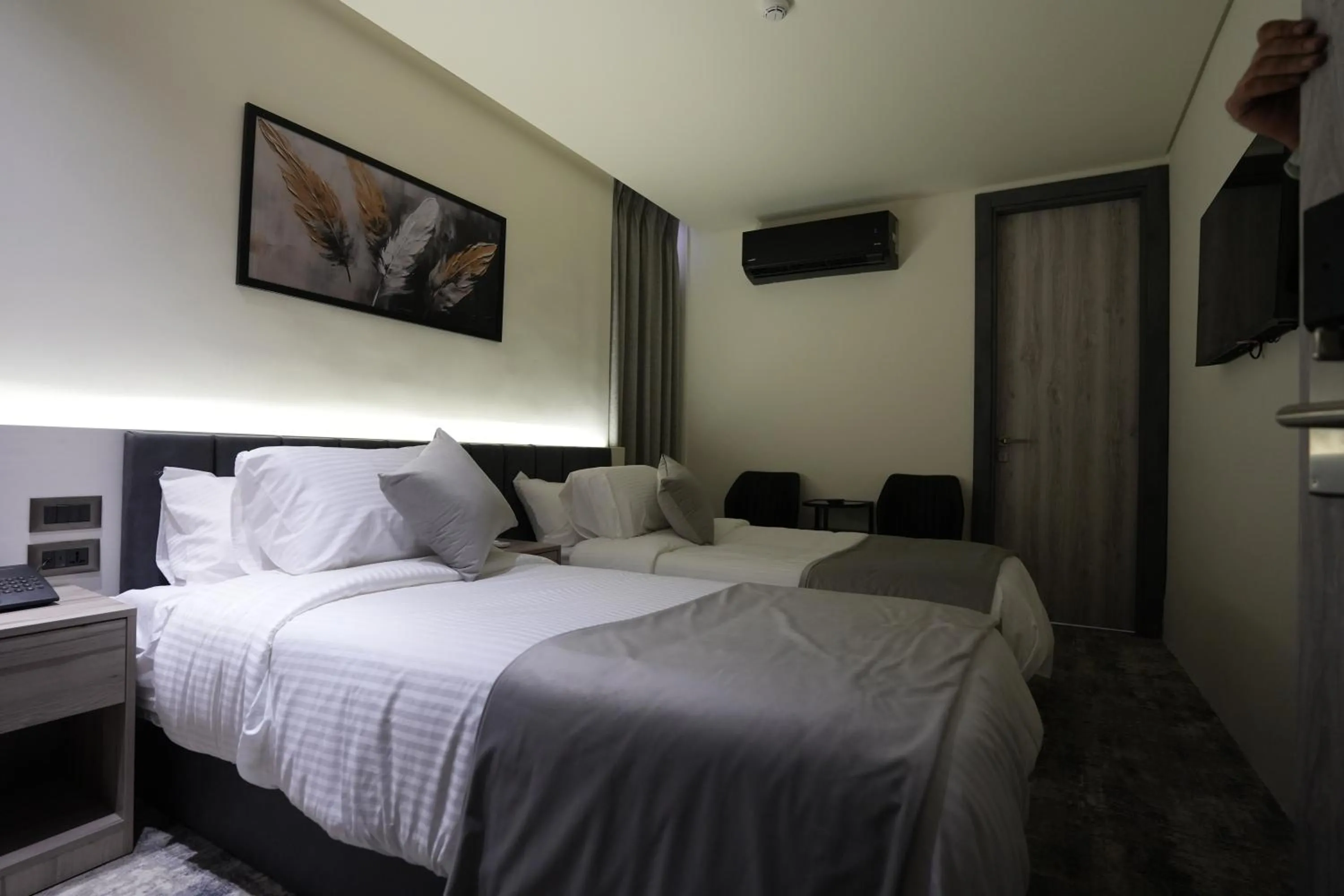 Bed in Roya Downtown Boutique Hotel