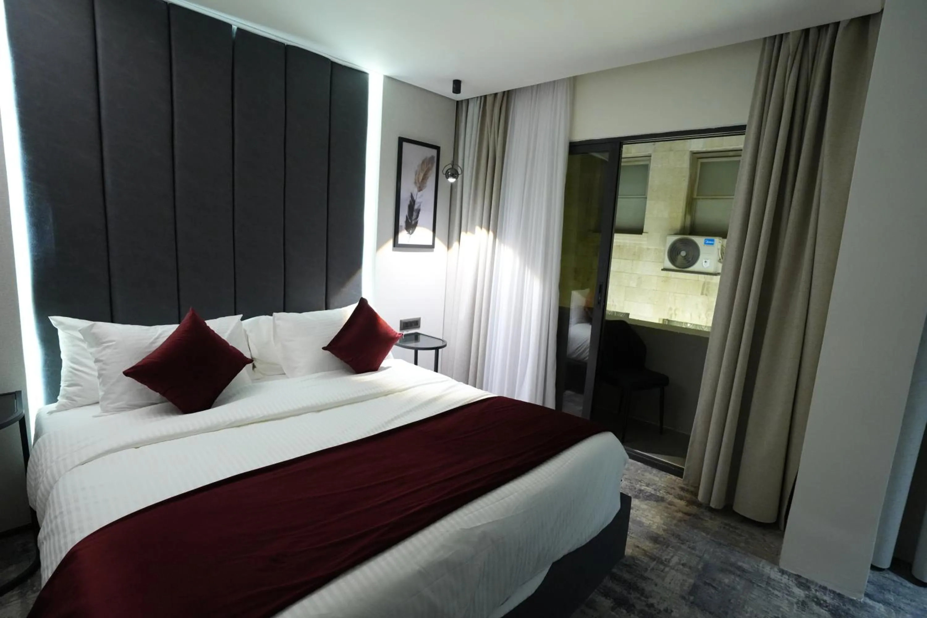 Bed in Roya Downtown Boutique Hotel