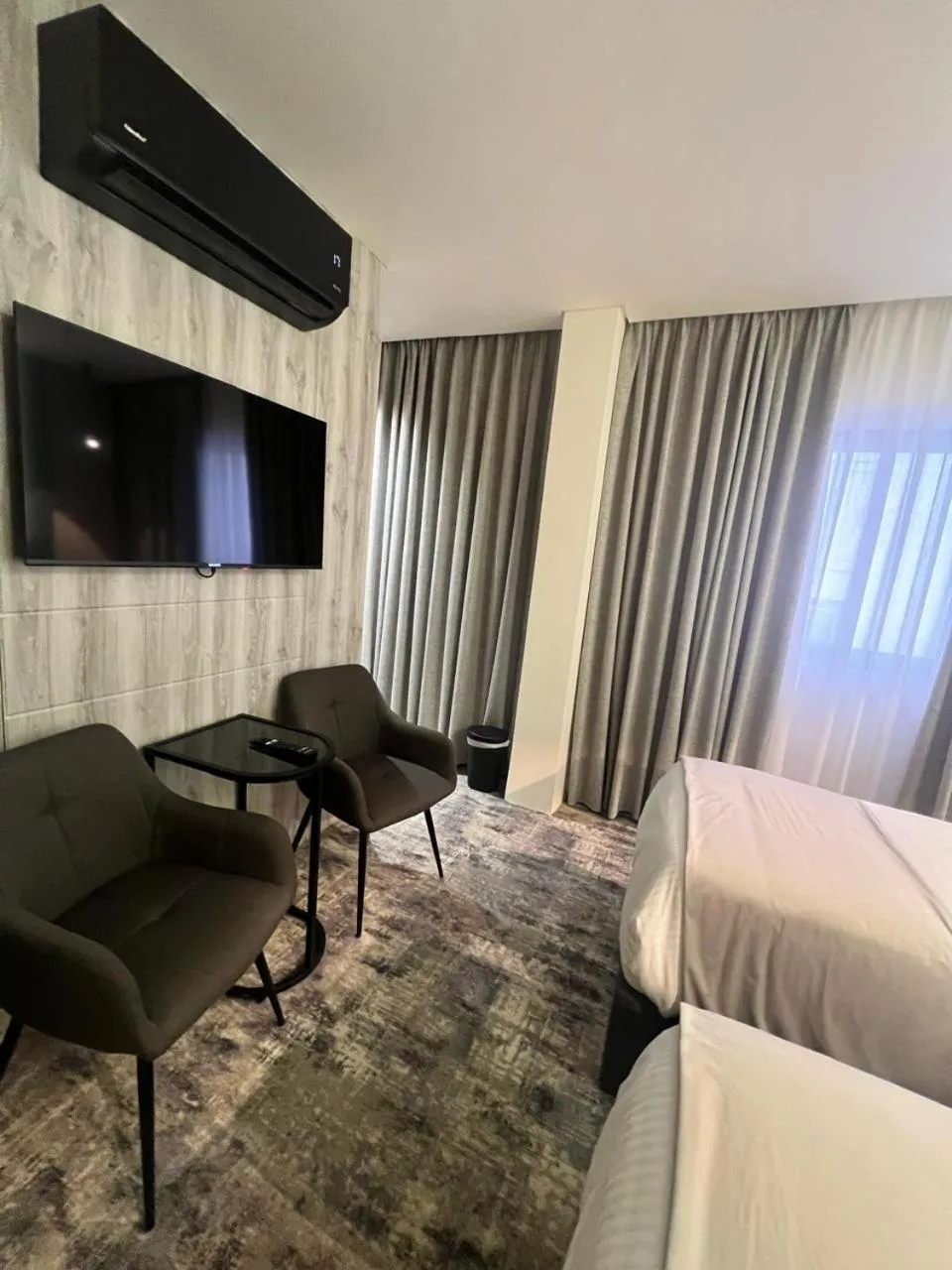 Bed in Roya Downtown Boutique Hotel