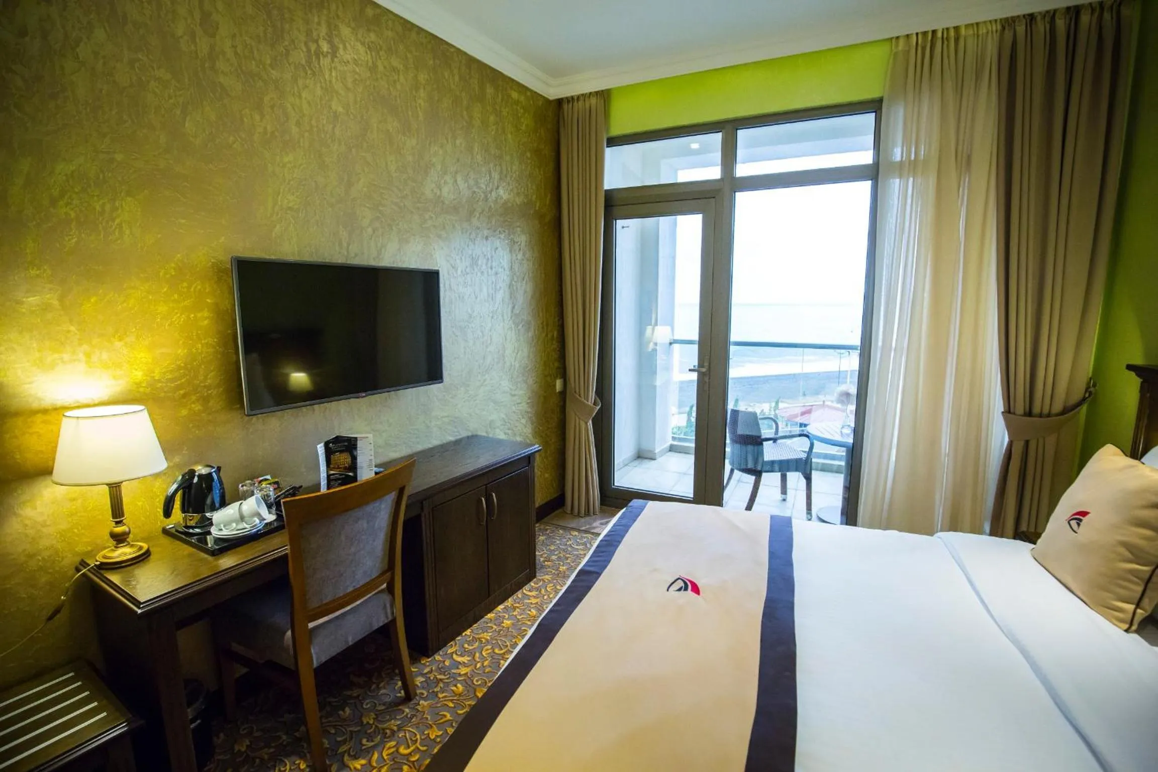 Seating area, Bed in Colosseum Marina Hotel