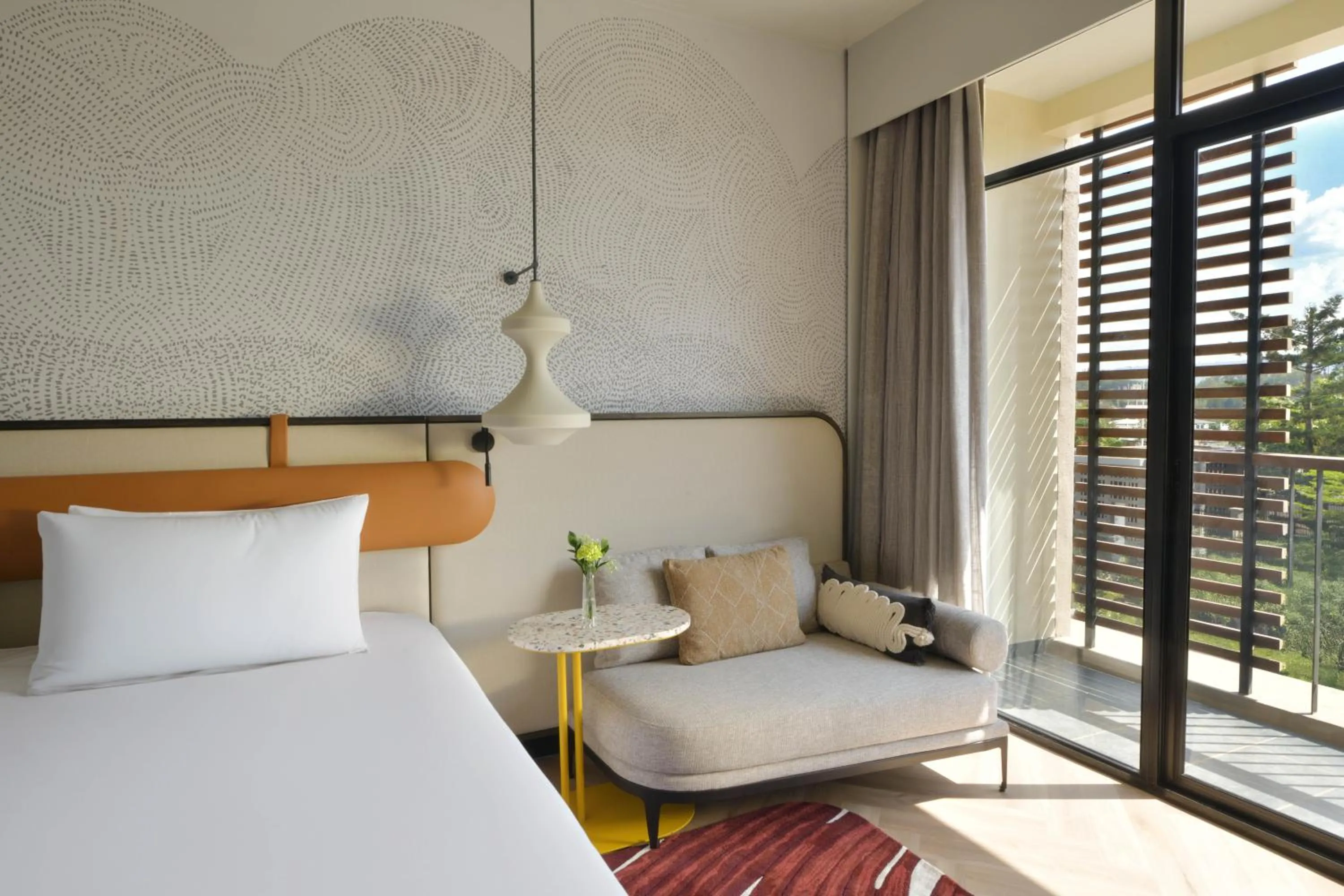 Bed in Mövenpick Kigali