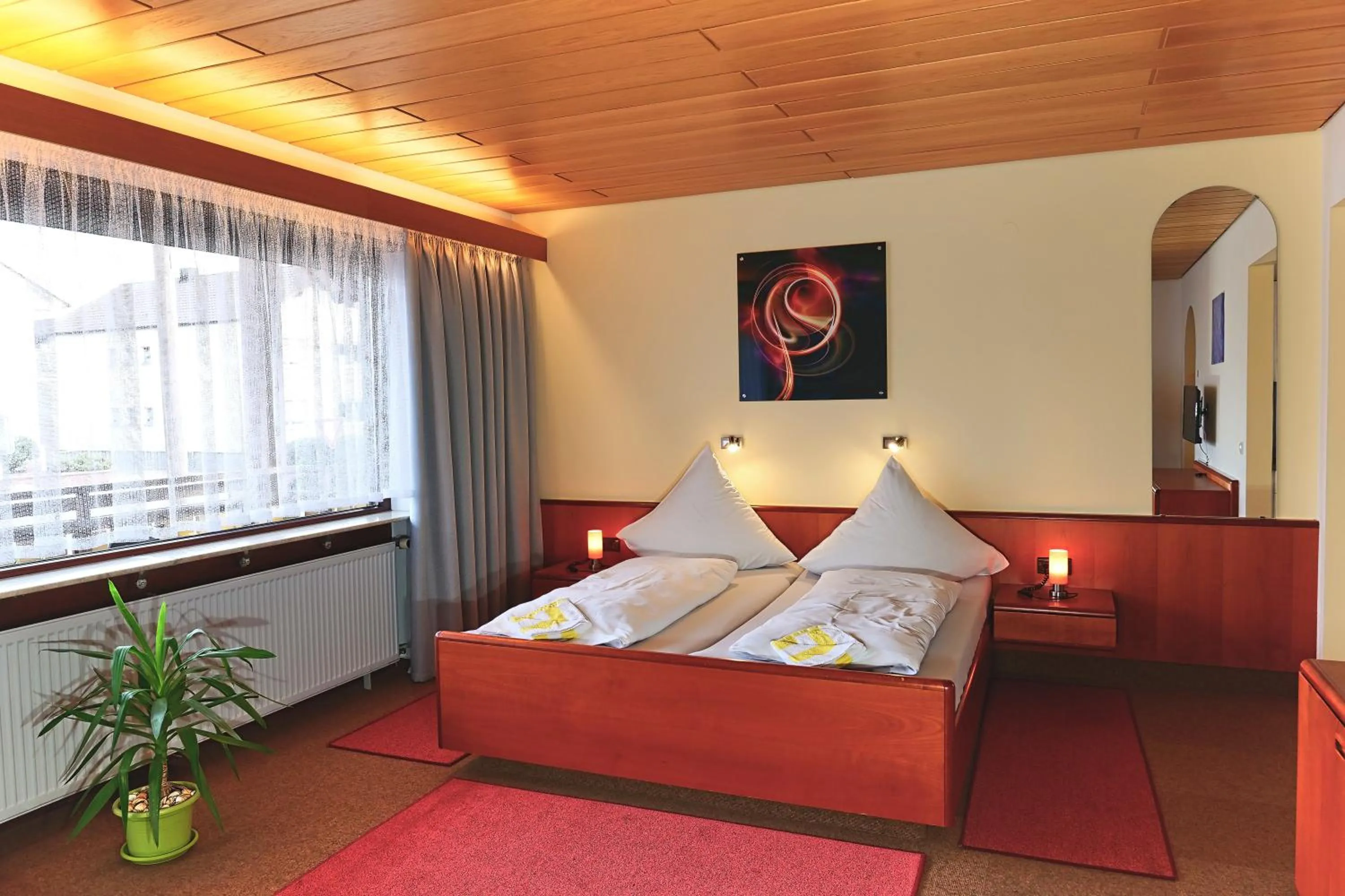 Bed in Hotel Garni Sebastian