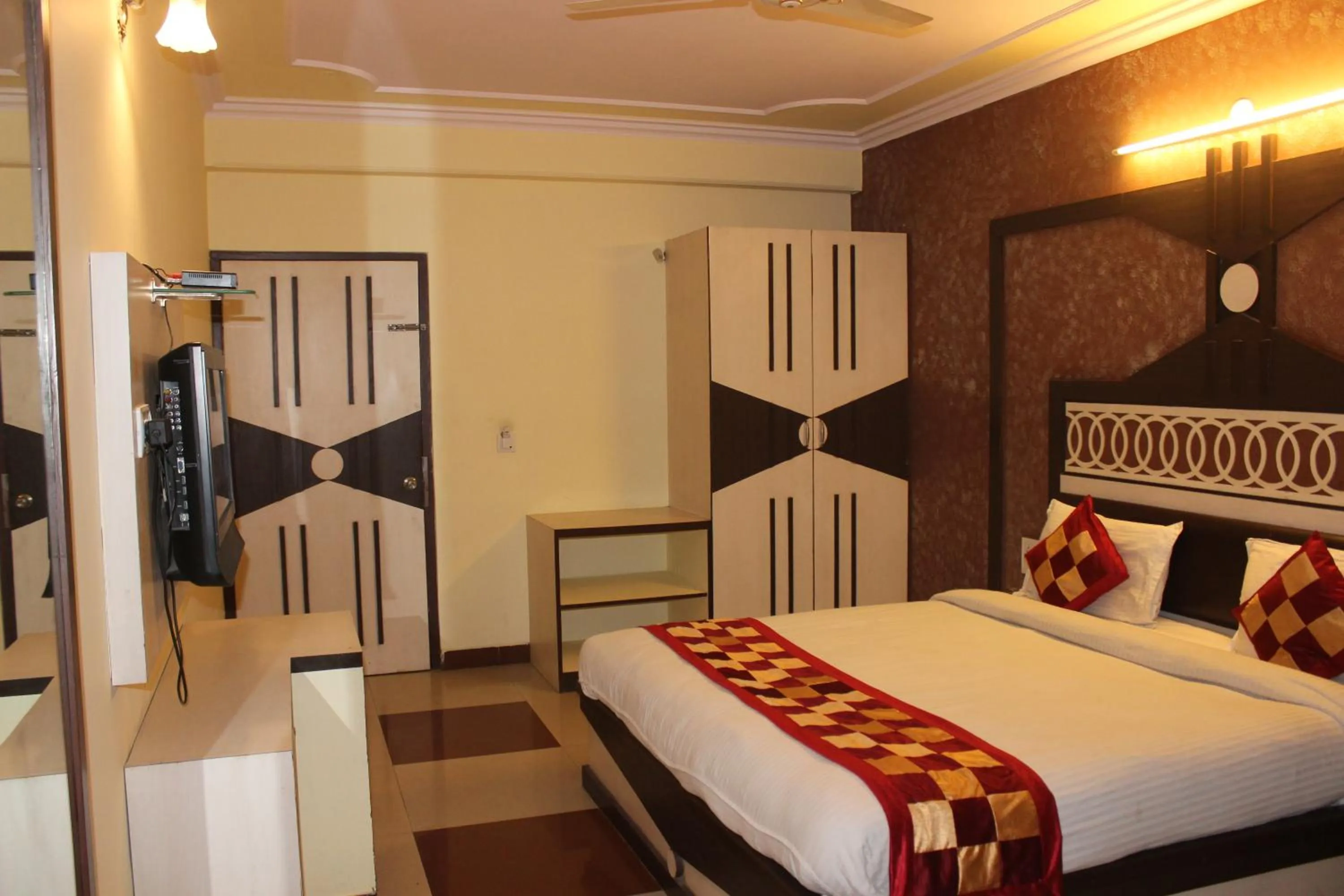 TV and multimedia, Bed in Hotel Muskan Palace