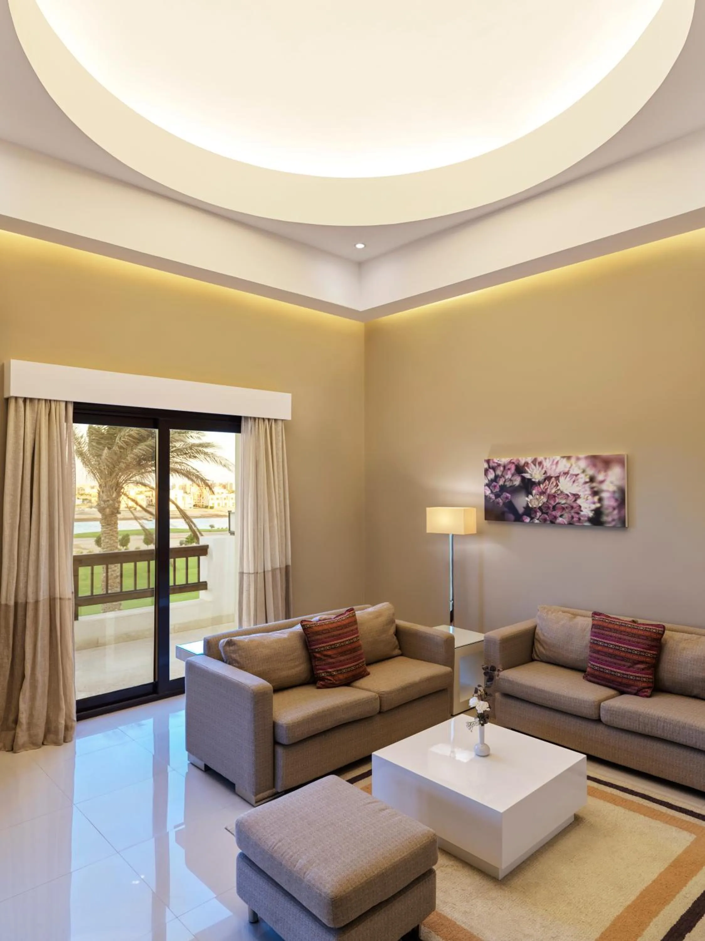 Living room in Ancient Sands Golf Resort and Residences