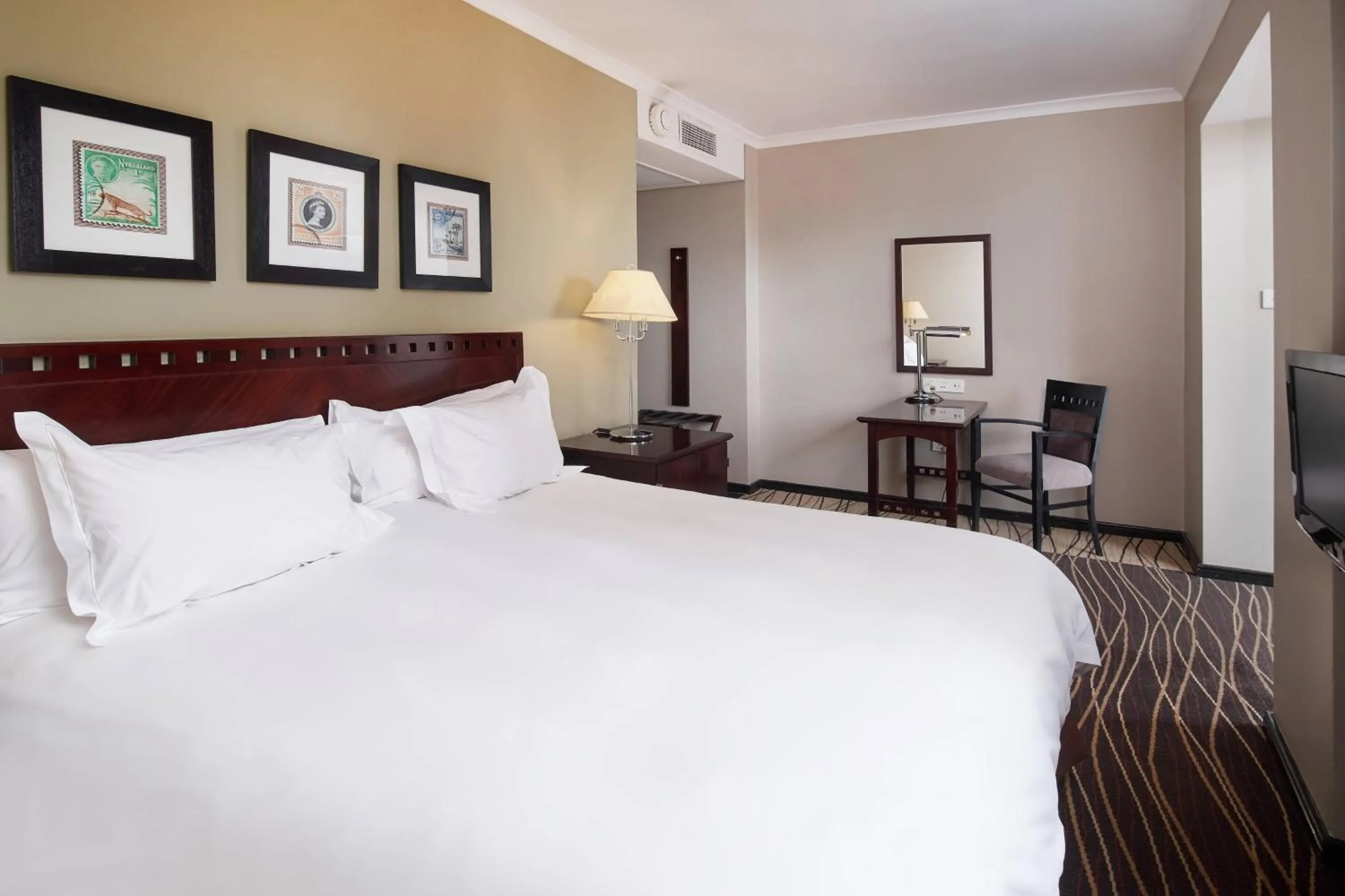 Photo of the whole room, Bed in Protea Hotel by Marriott Blantyre Ryalls