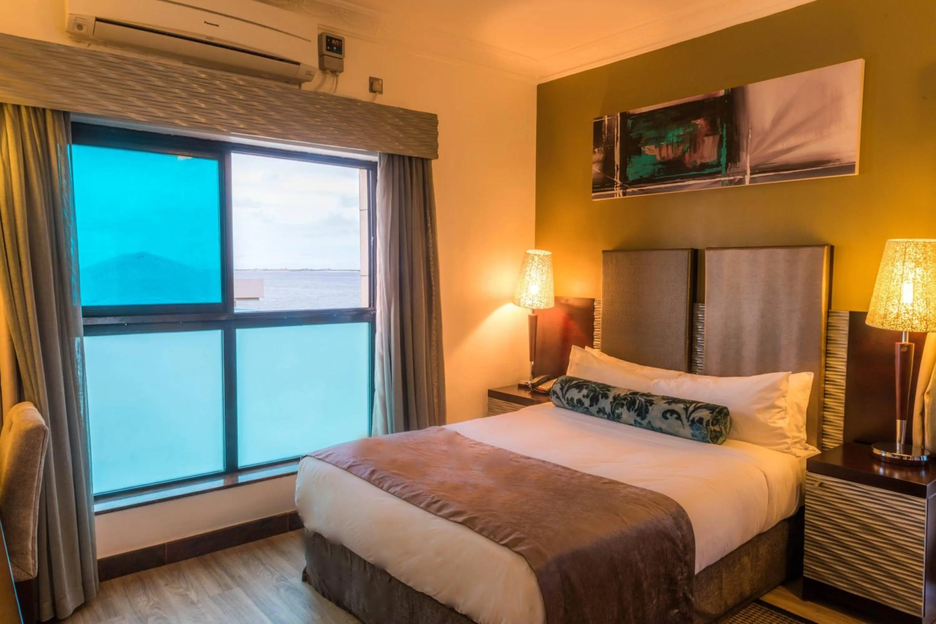 Photo of the whole room, Bed in Protea Hotel by Marriott Lagos Kuramo Waters