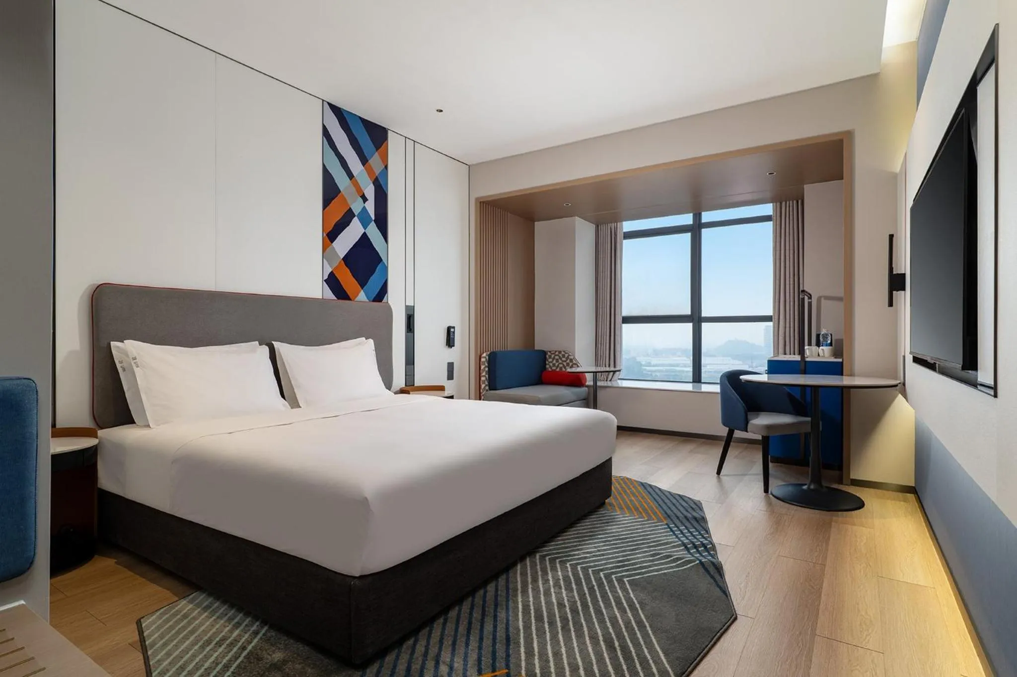 Photo of the whole room, Bed in Holiday Inn Express Sihui City Center