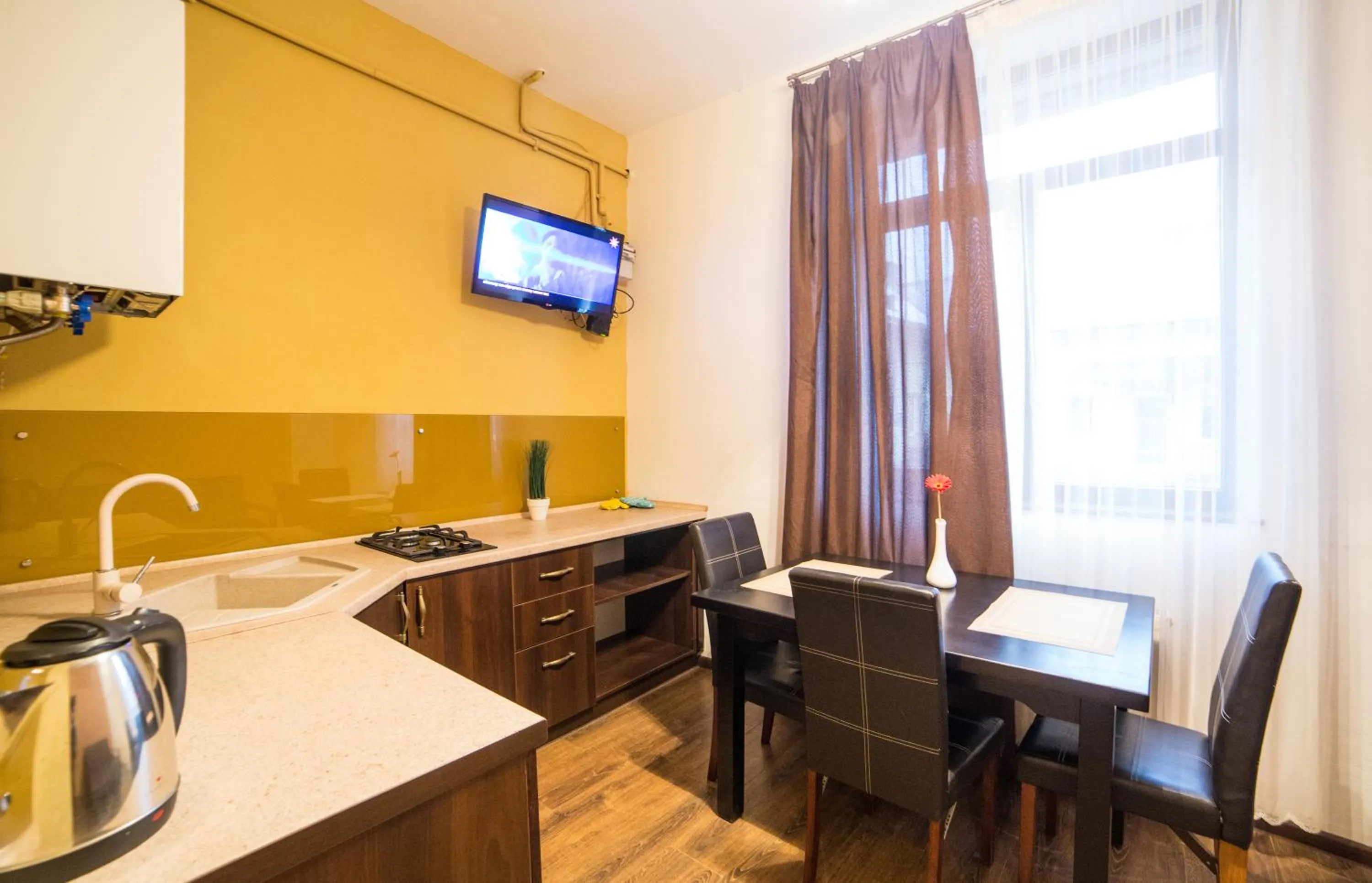 Kitchen or kitchenette in Aparthotel Na Mytniy