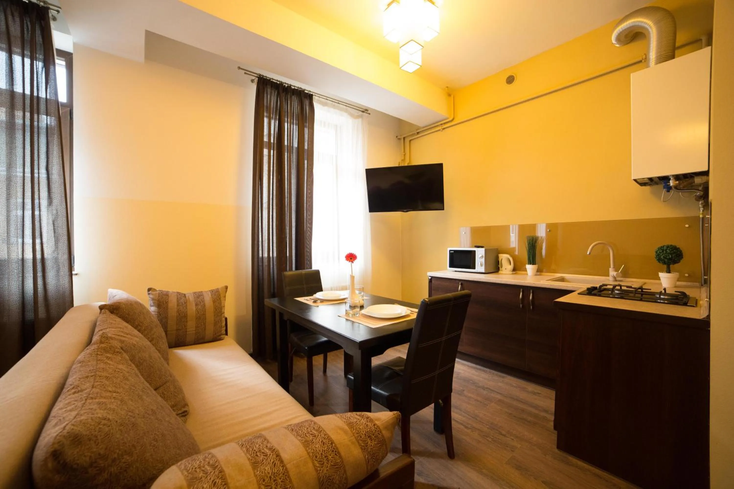 Kitchen or kitchenette in Aparthotel Na Mytniy