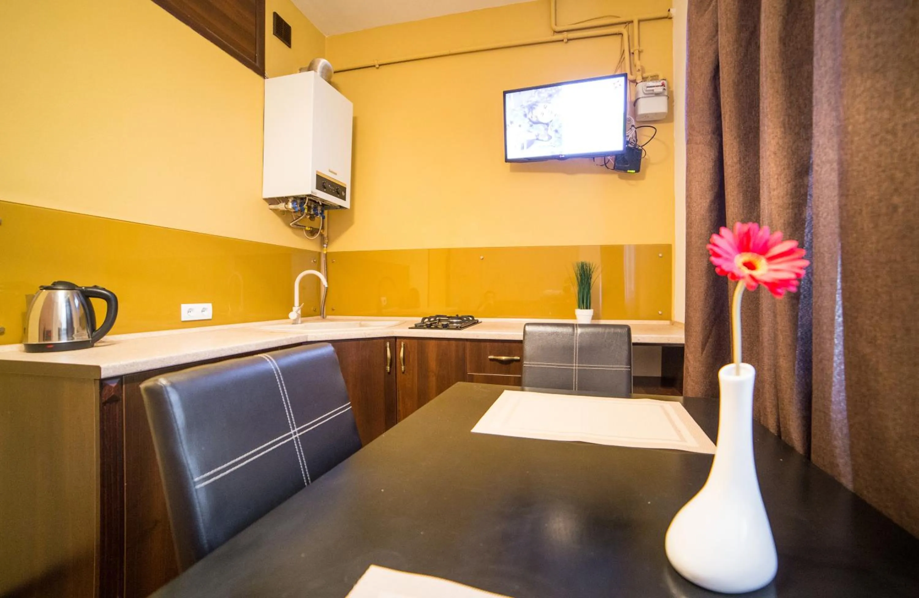Kitchen or kitchenette in Aparthotel Na Mytniy