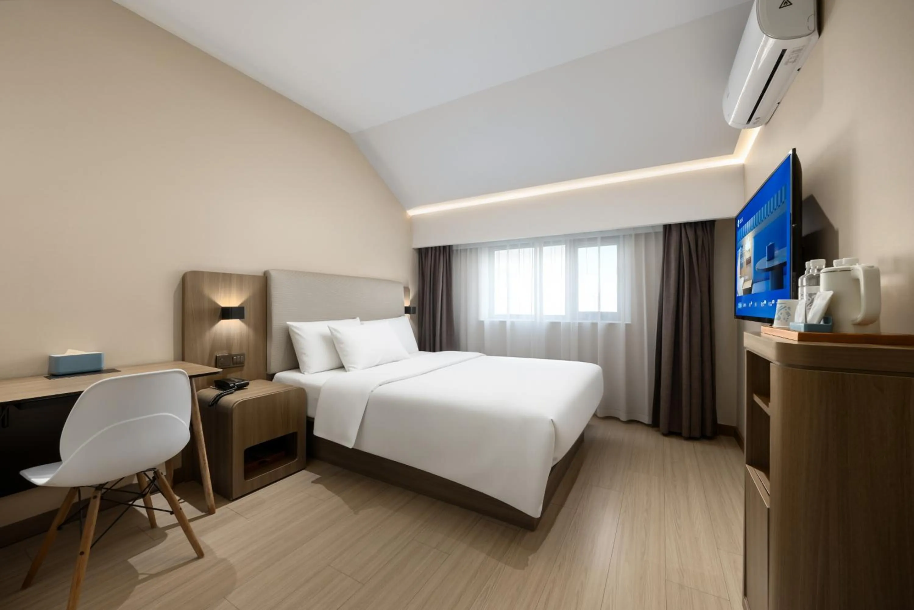 Bed in Hanting Hotel Beijing Deshengmen