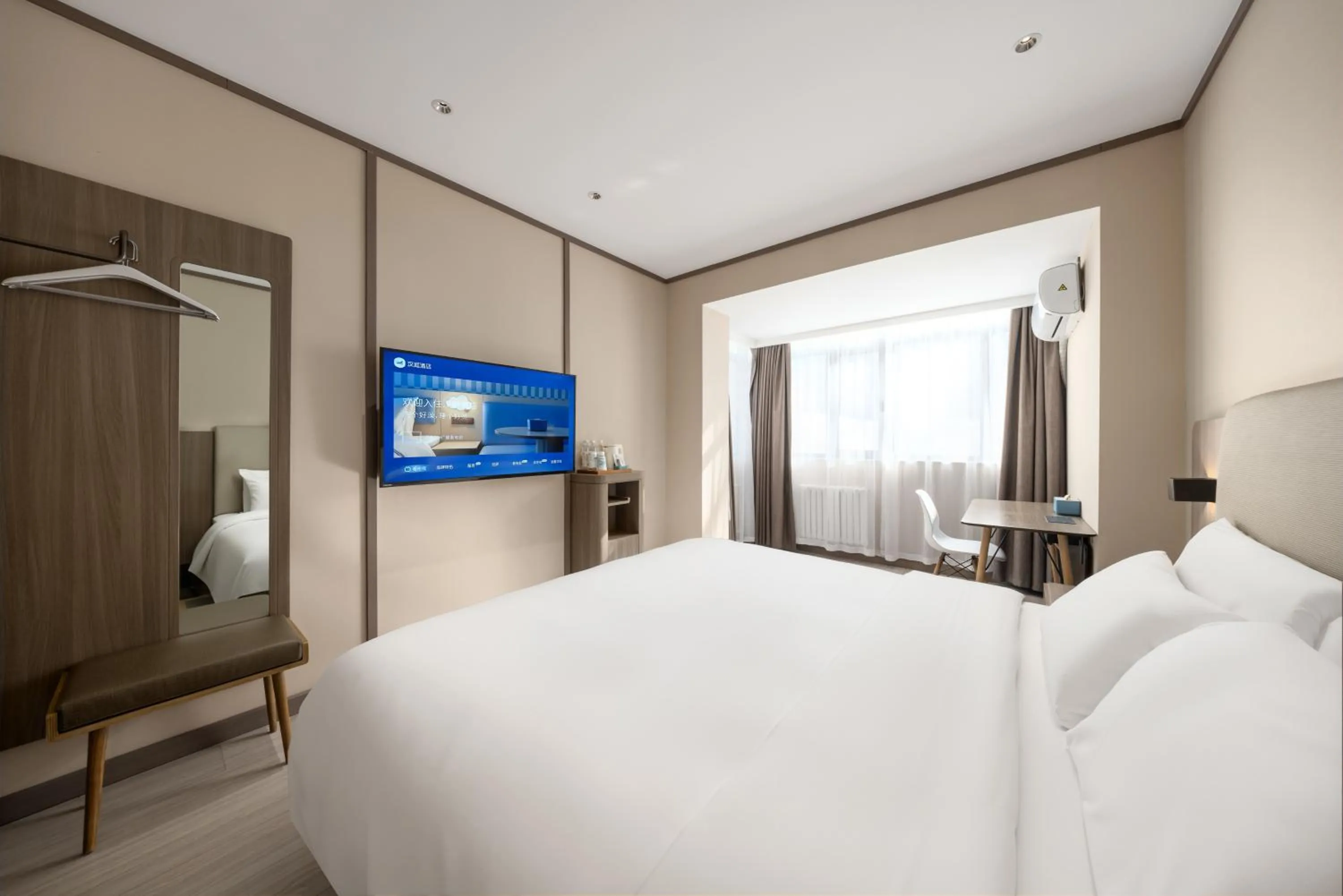 Bed in Hanting Hotel Beijing Deshengmen