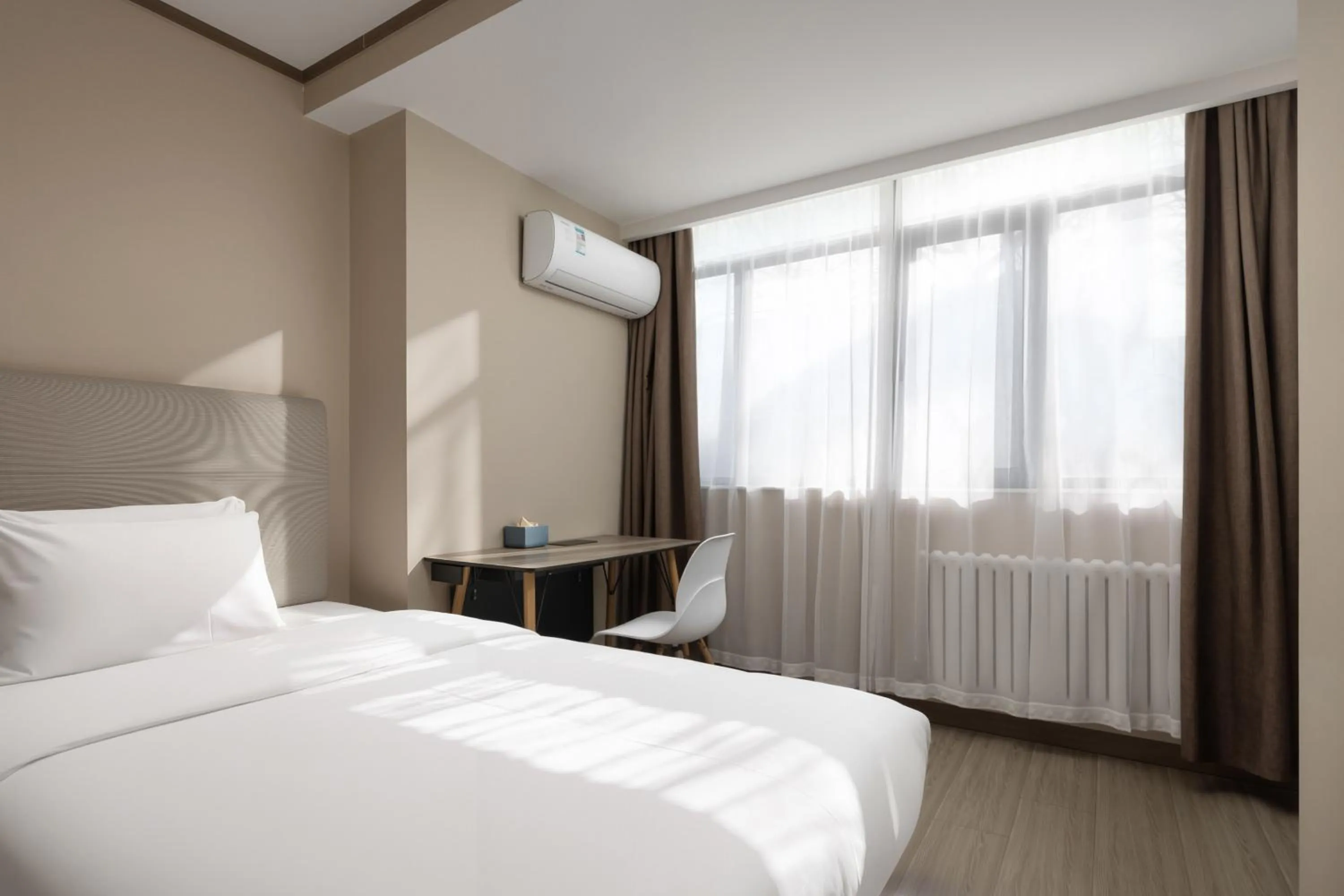 Bed in Hanting Hotel Beijing Deshengmen