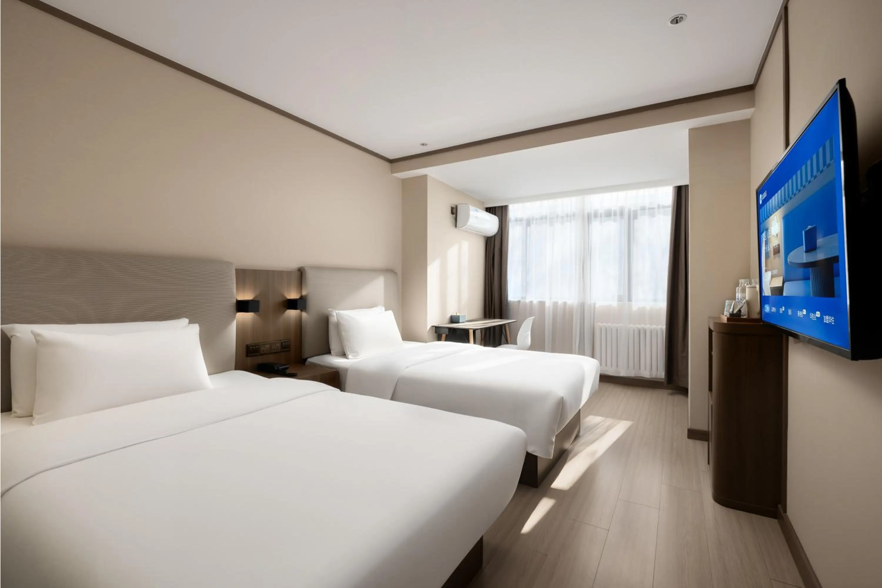 Bed in Hanting Hotel Beijing Deshengmen