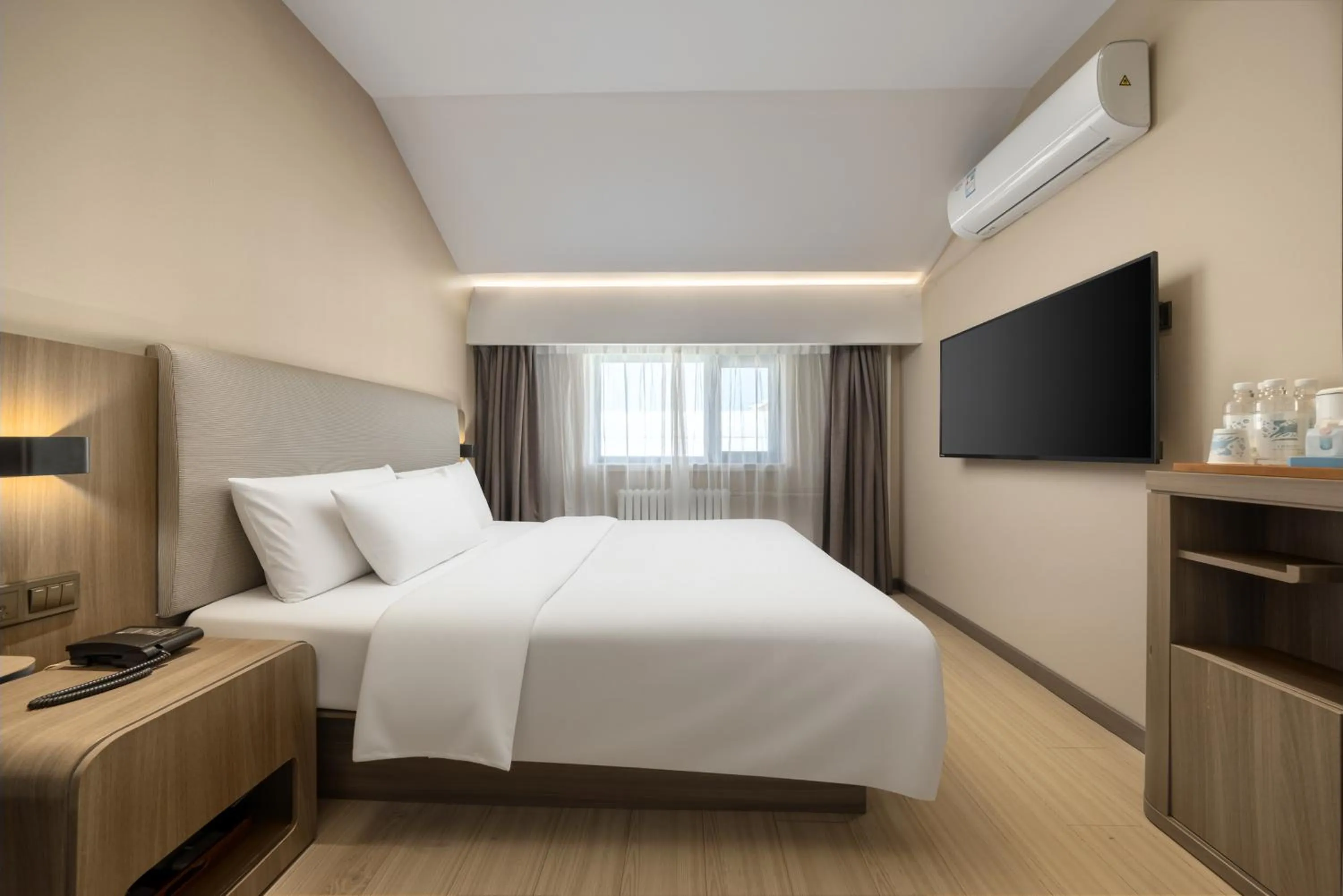 Bed in Hanting Hotel Beijing Deshengmen