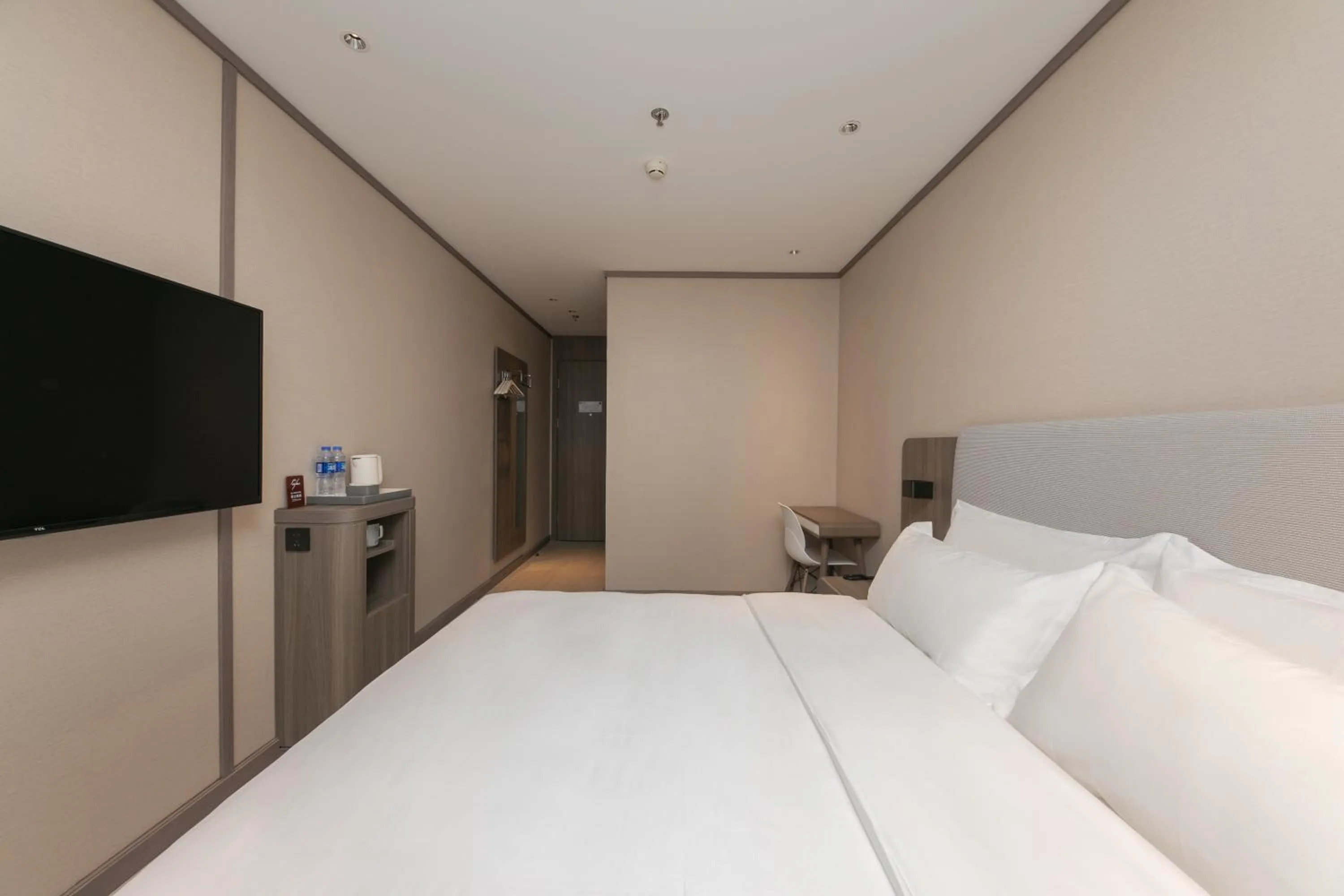 Bed in Hanting Hotel Beijing South Railway Station Gongyi Dongqiao