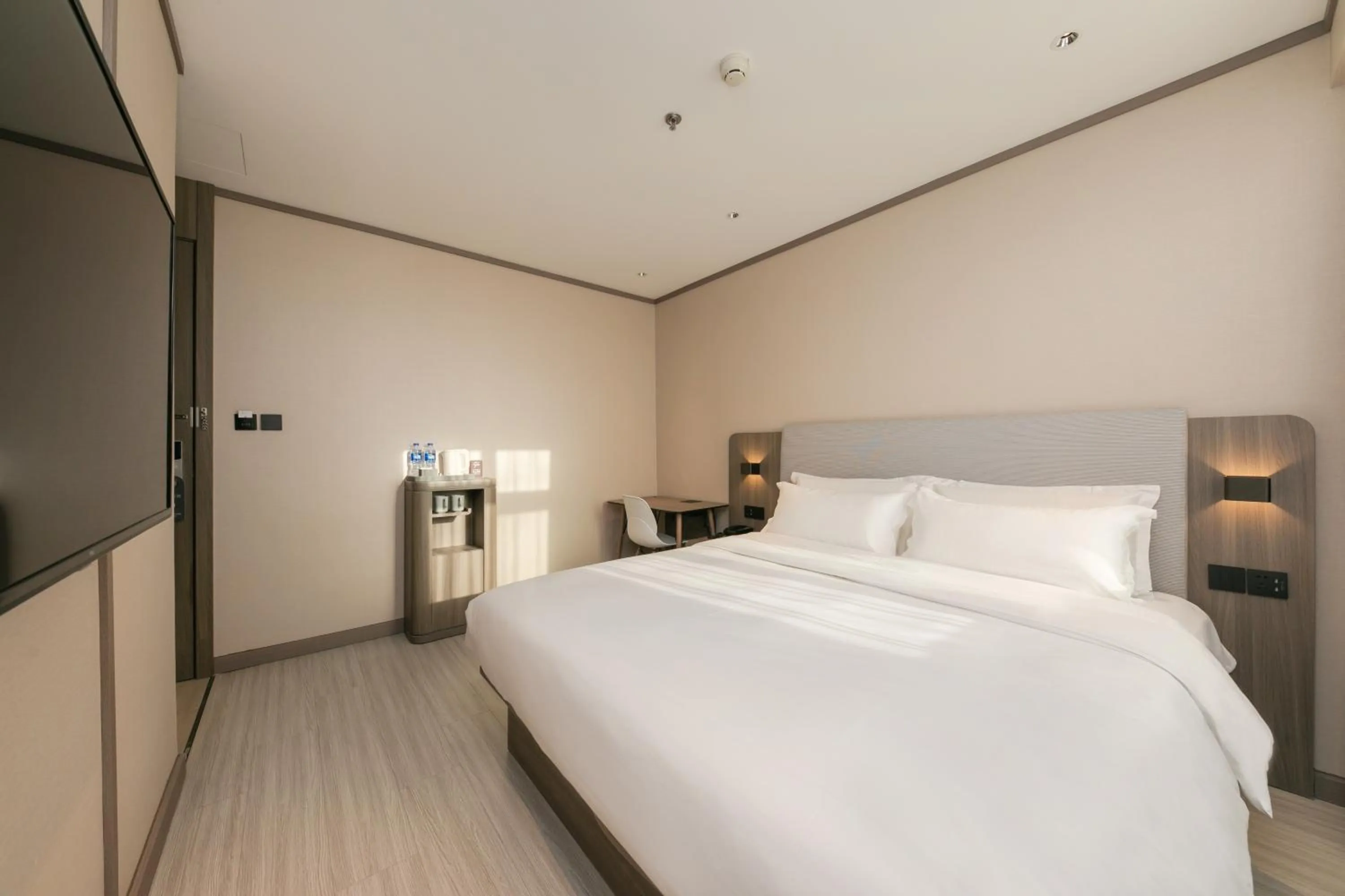 Bed in Hanting Hotel Beijing South Railway Station Gongyi Dongqiao