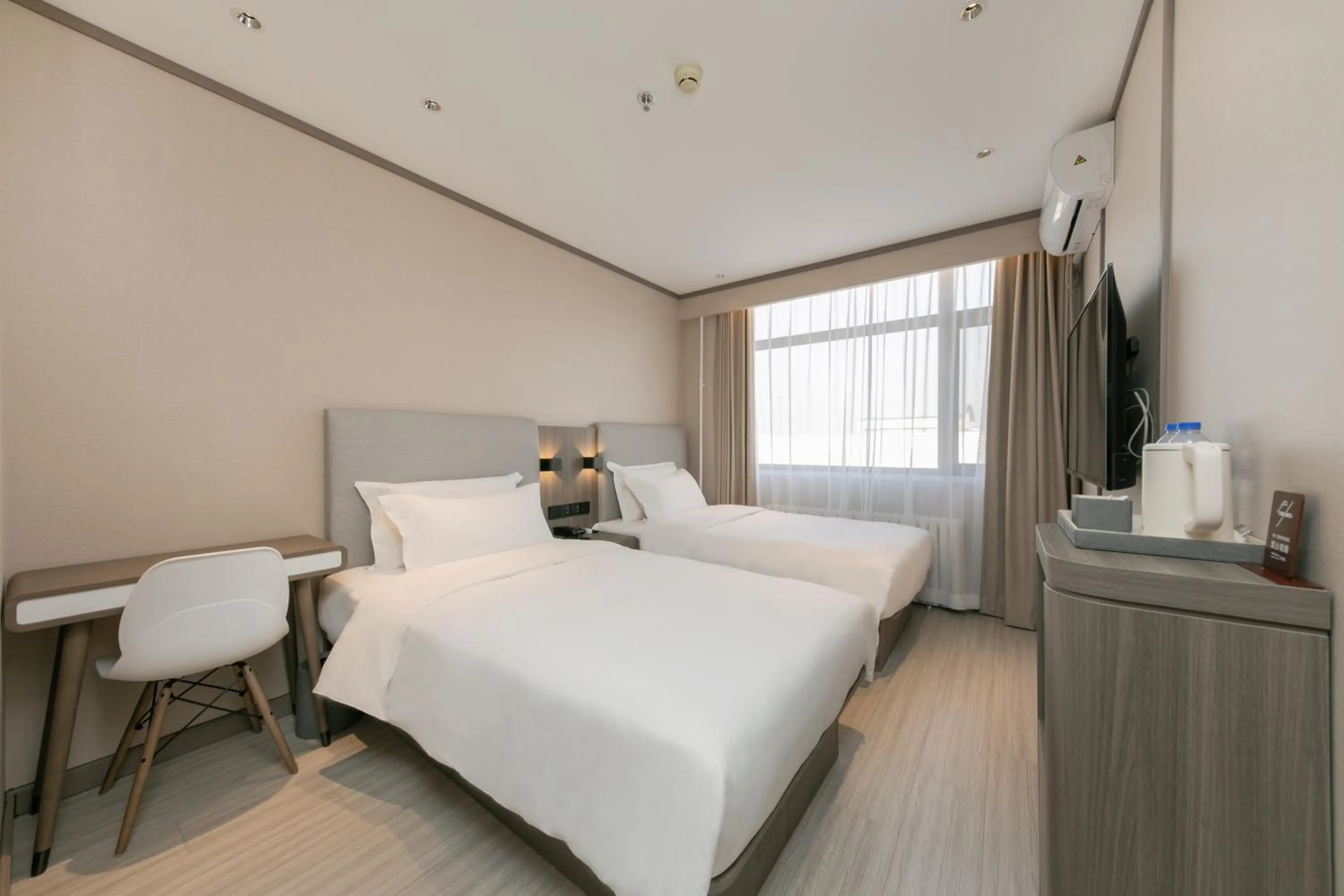 Bed in Hanting Hotel Beijing South Railway Station Gongyi Dongqiao