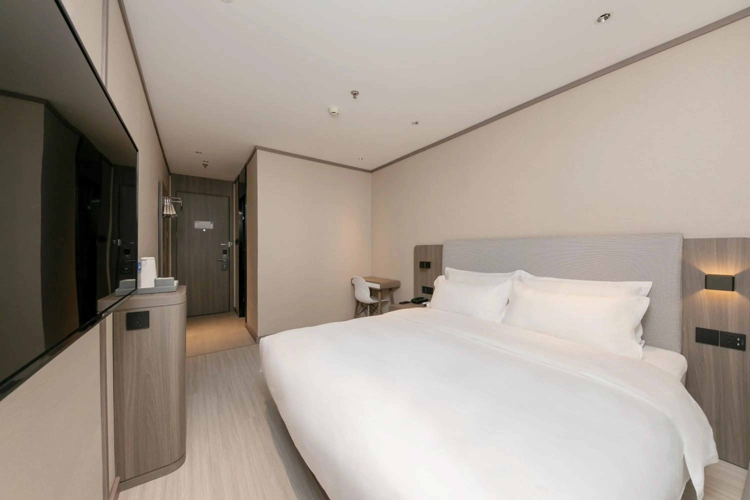 Bed in Hanting Hotel Beijing South Railway Station Gongyi Dongqiao