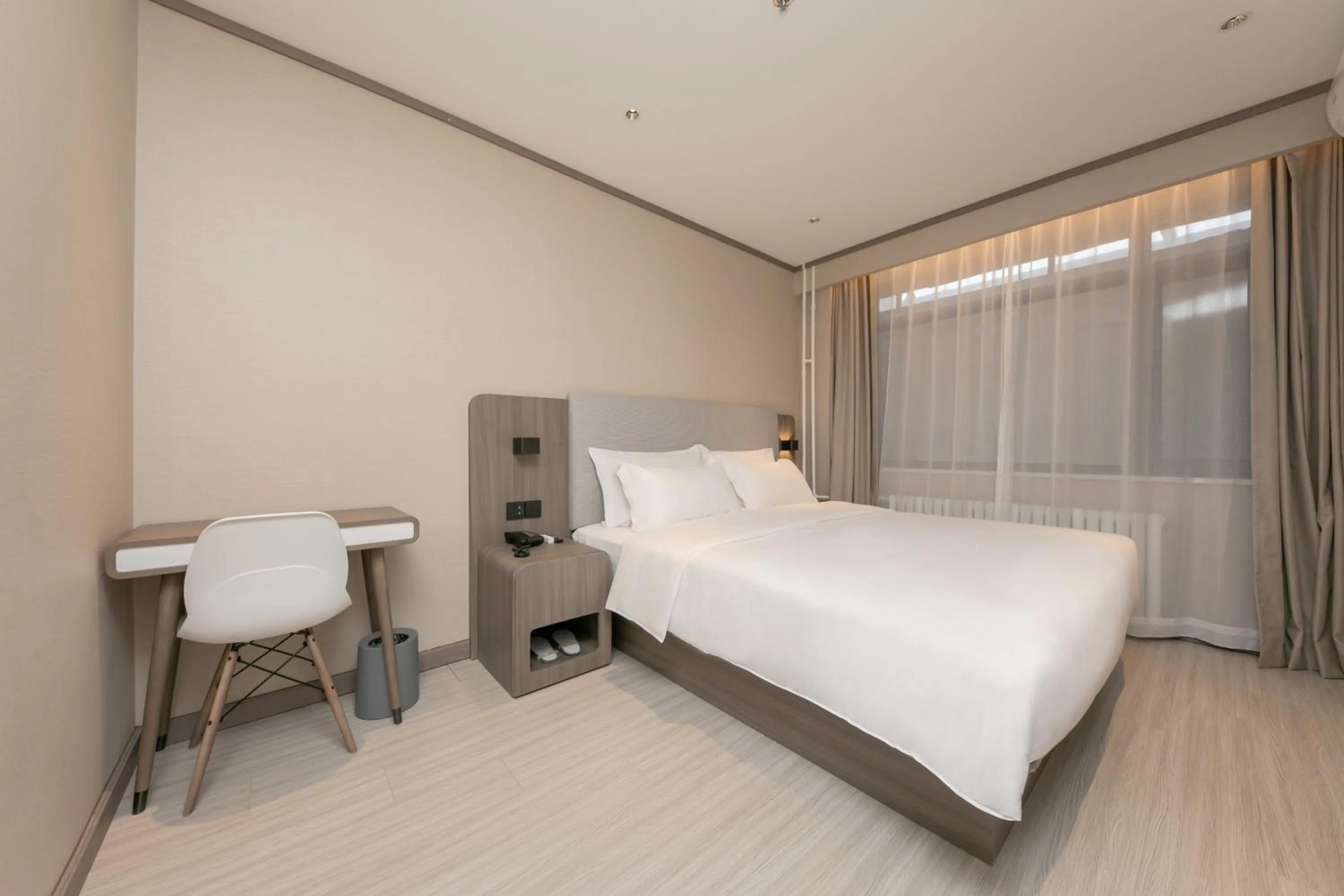 Bed in Hanting Hotel Beijing South Railway Station Gongyi Dongqiao