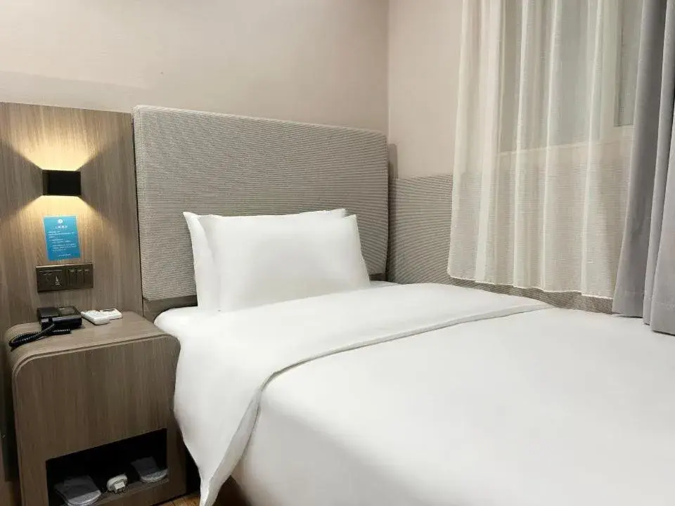 Bed in Hanting Hotel Shanghai Jing'an Temple Xikang Road Bed in Hanting Hotel Shanghai Jing'an Temple Xikang Road