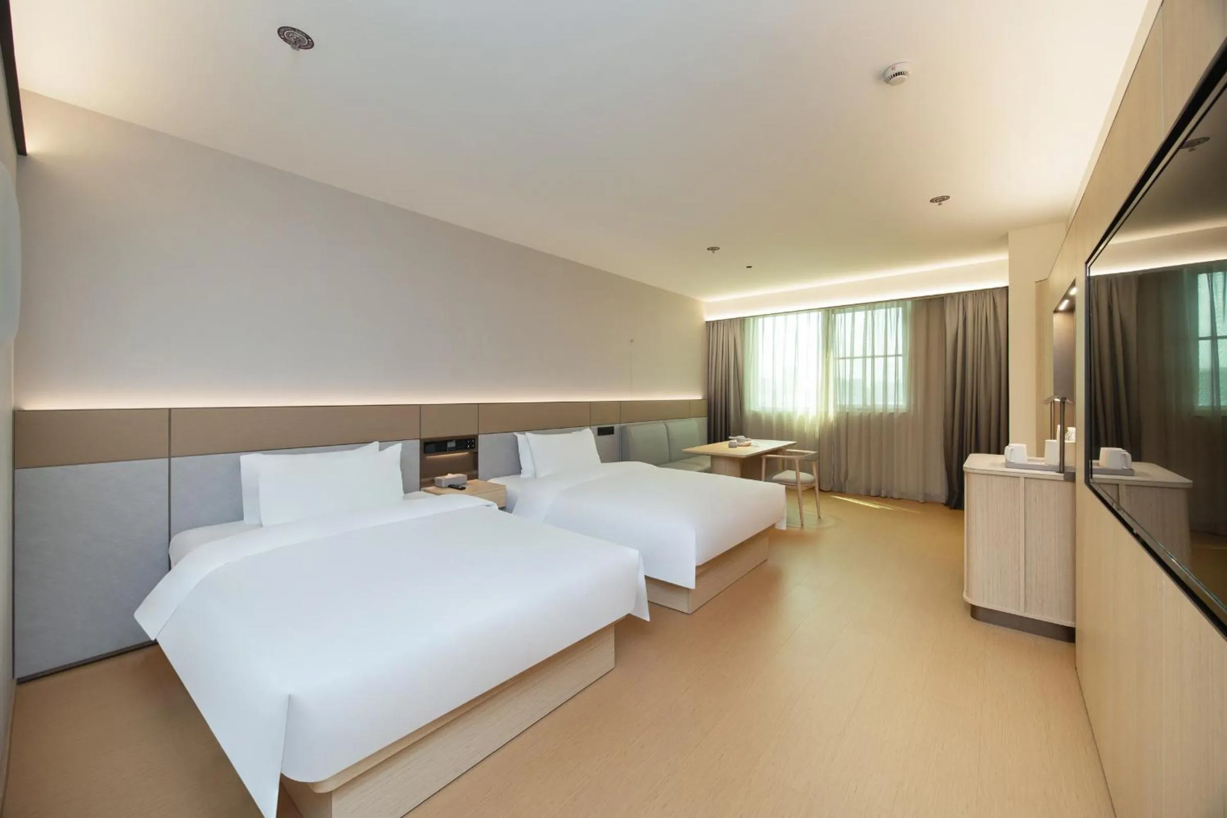 Bed in JI Hotel Shanghai Caohejing