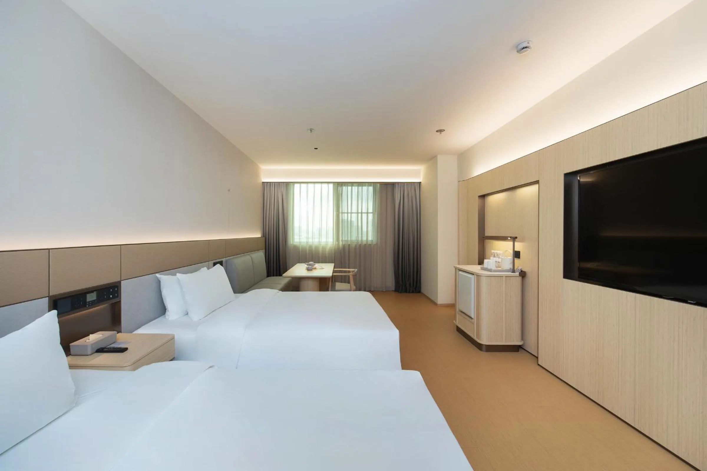 Bed in JI Hotel Shanghai Caohejing