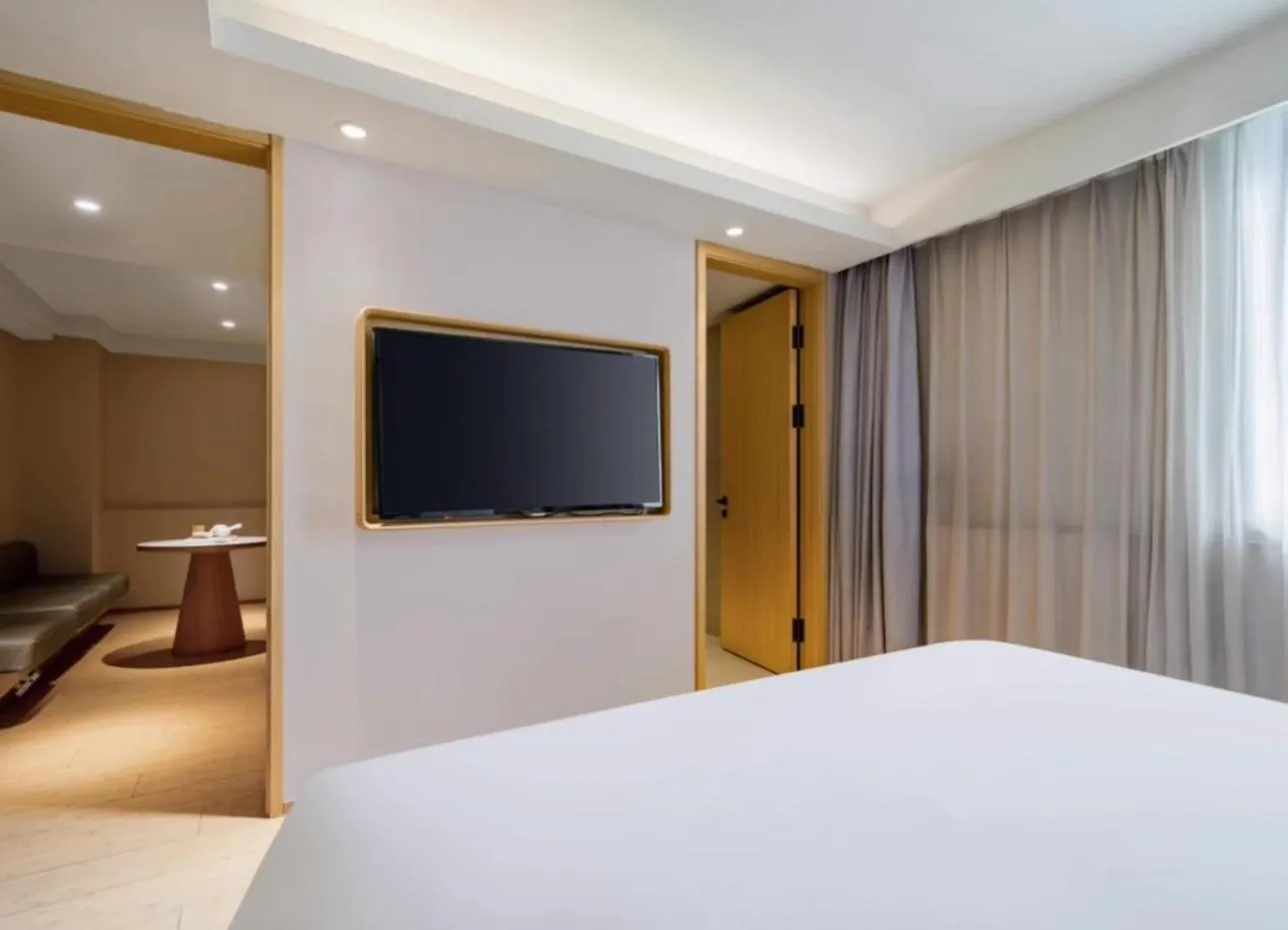 Bed in JI Hotel Shanghai Hongmei South Road Subway Station