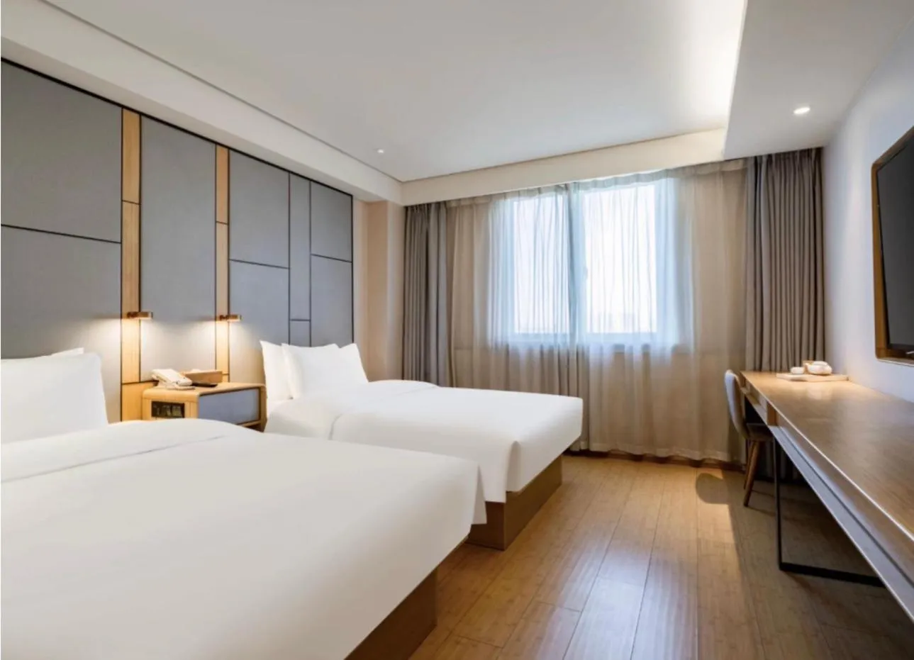 Bed in JI Hotel Shanghai Hongmei South Road Subway Station