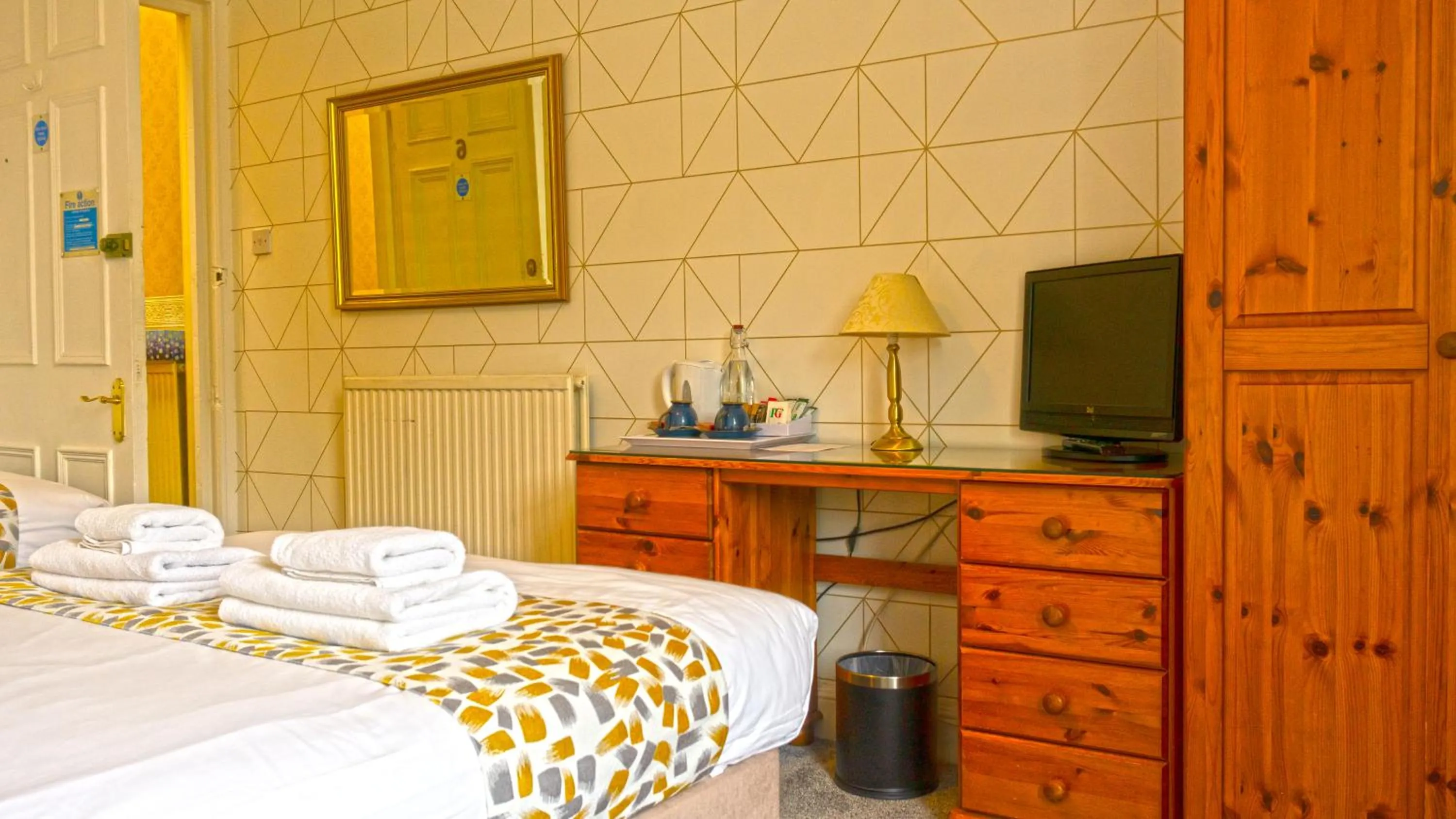 Bed in Arrandale Guest House