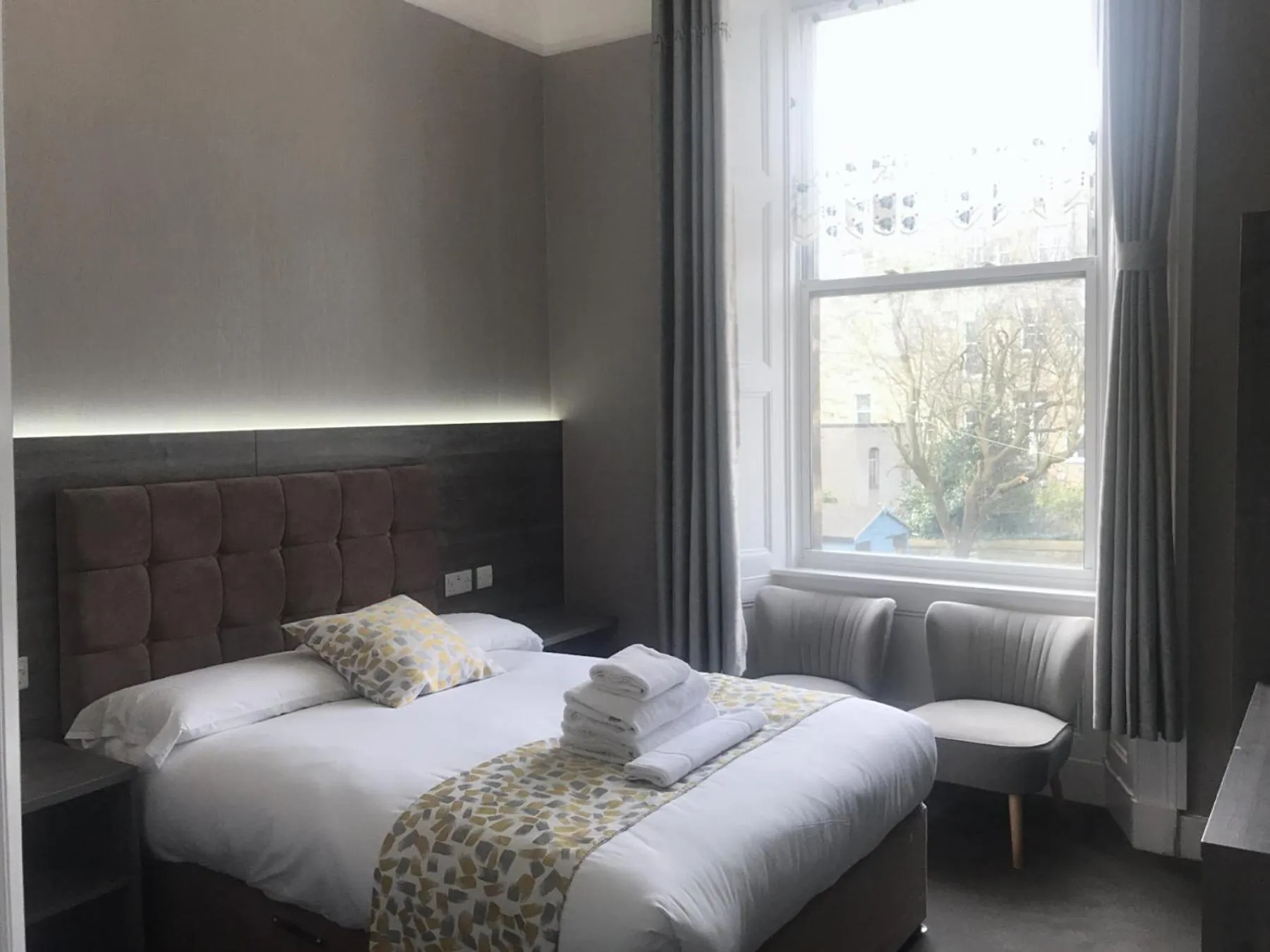 Bed in Arrandale Guest House