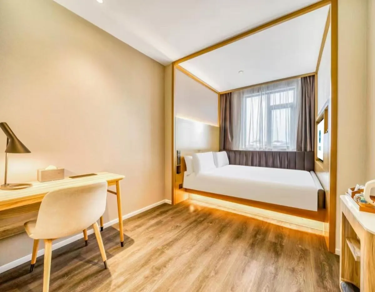 Bed in Hanting Premium Hotel Shanghai Fengxian Sports Center