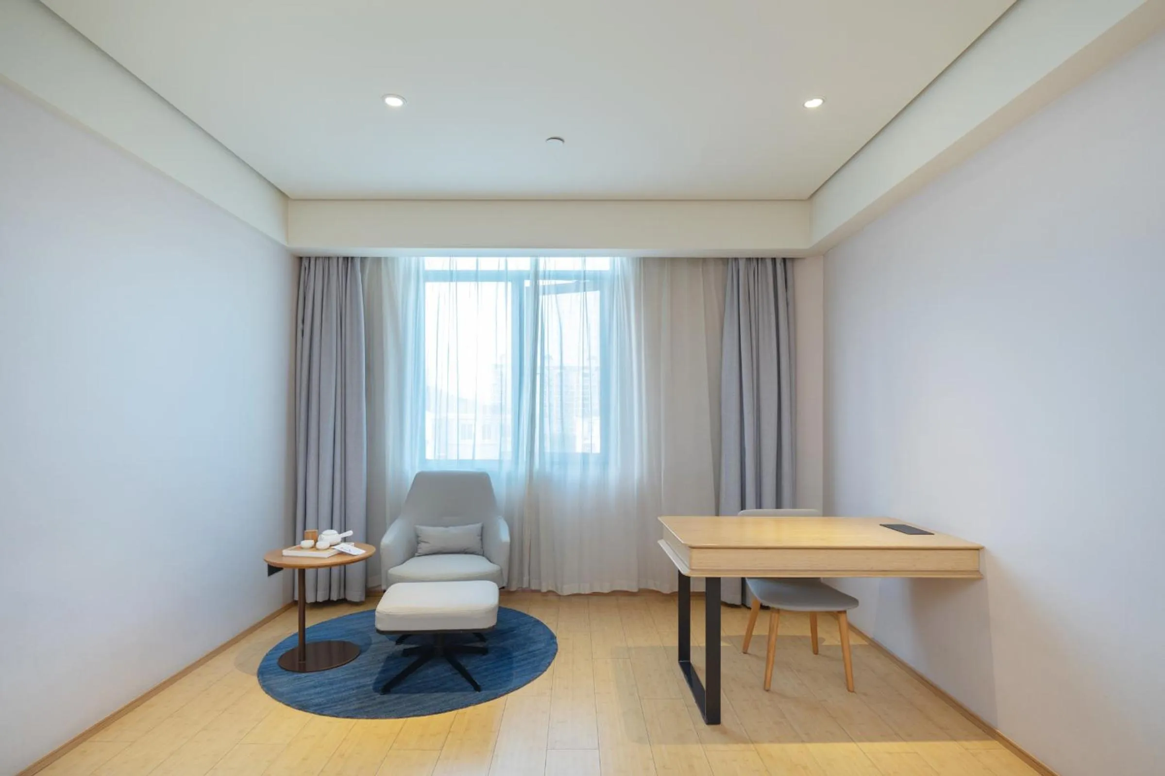 Seating area in JI Hotel Shanghai Jiuting Center