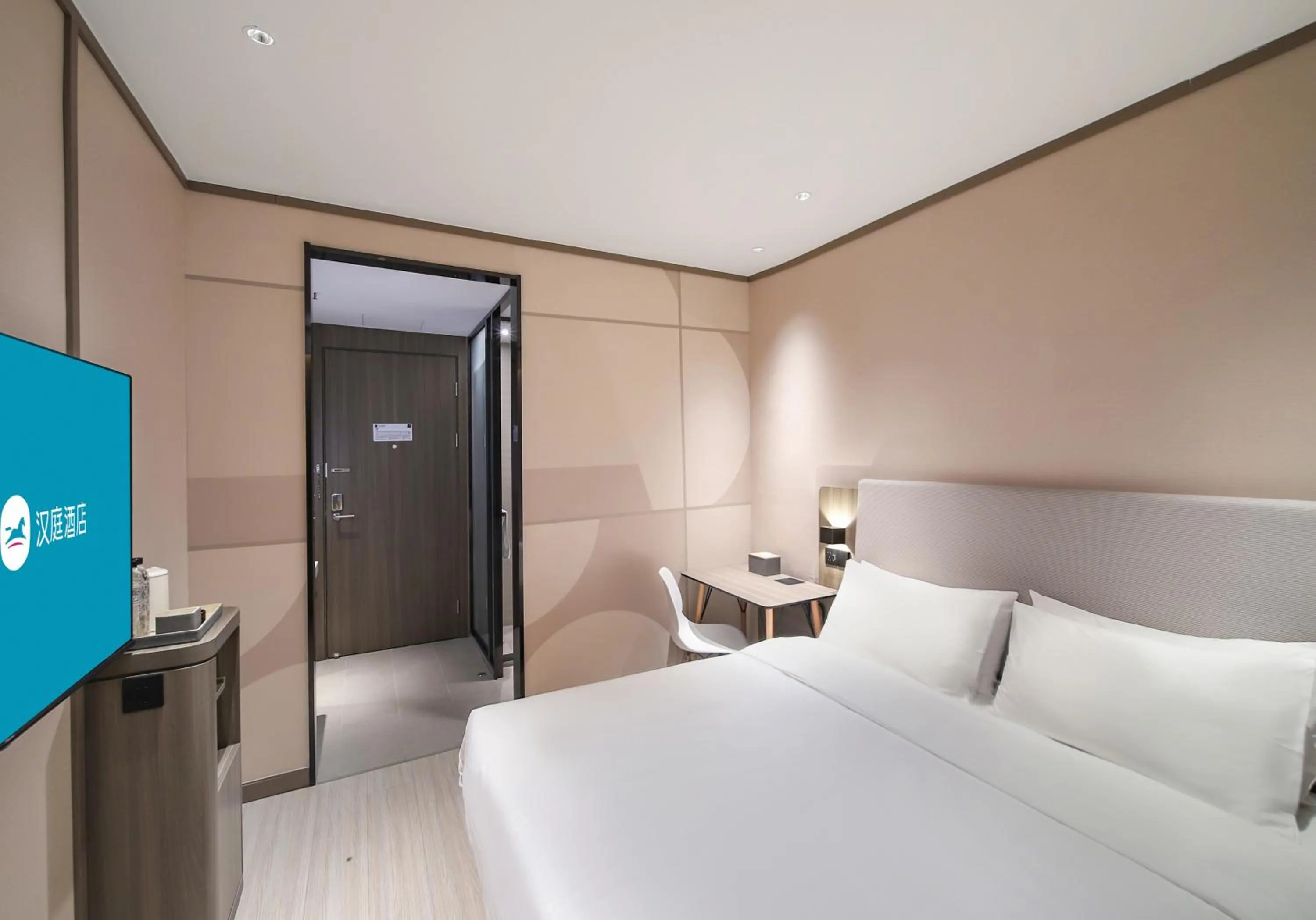 Bed in Hanting Hotel Nanjing Jiangpu Longhua Road Subway Station